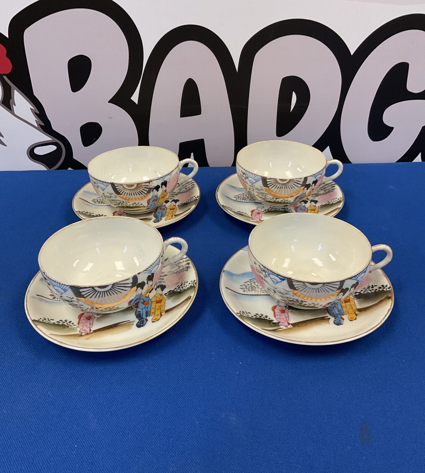 Set of four Japanese porcelain teacups & saucers