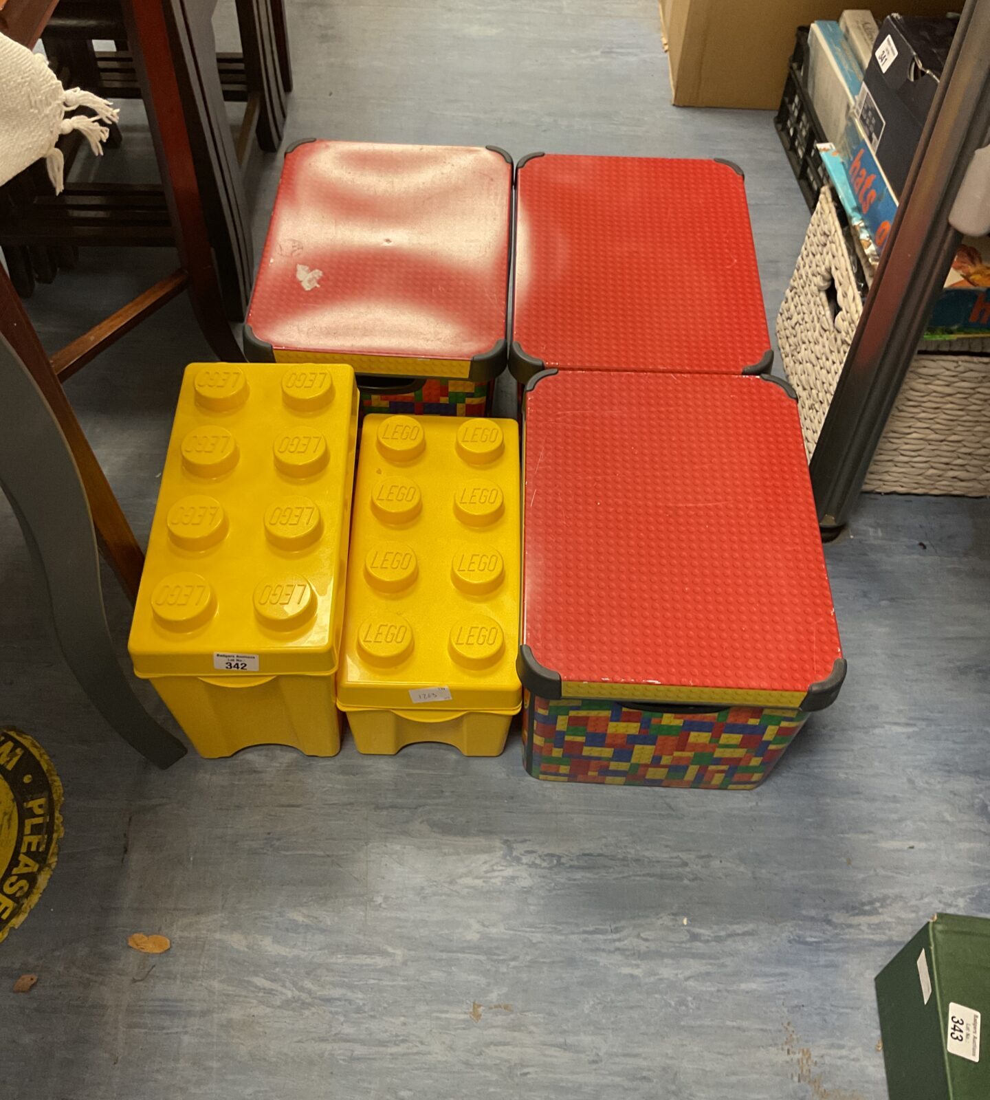 Four empty lego storage boxes