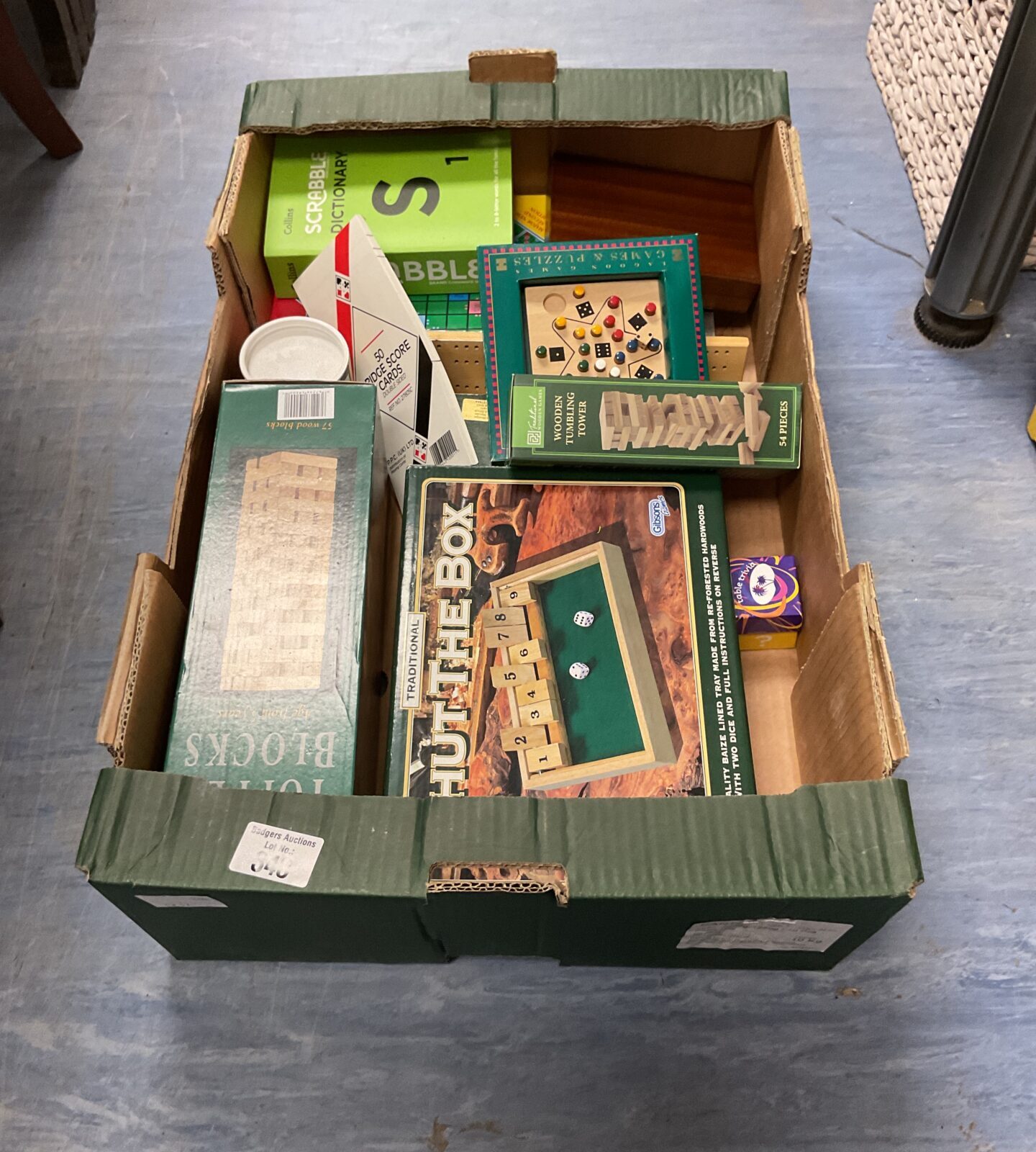Tray of mixe board games inc scrabble and wooden topple blocks