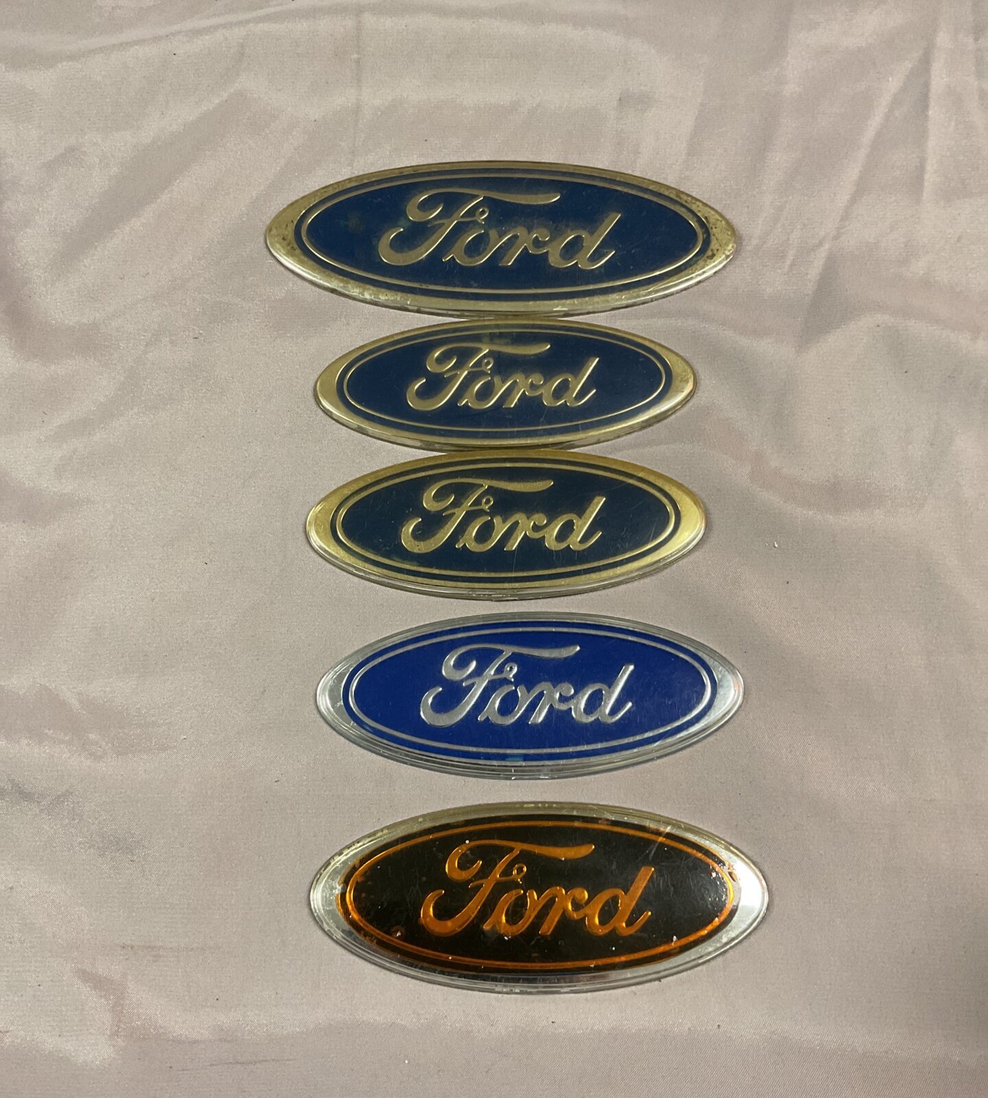 Five Ford car badges