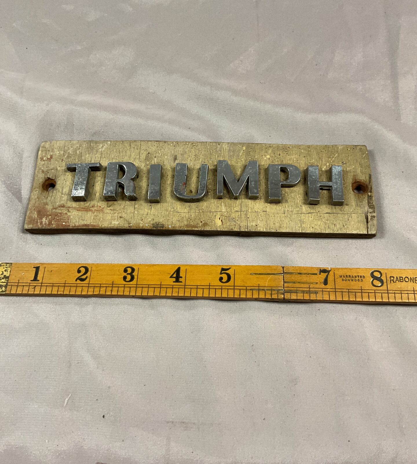 Classic car triumph chrome letters