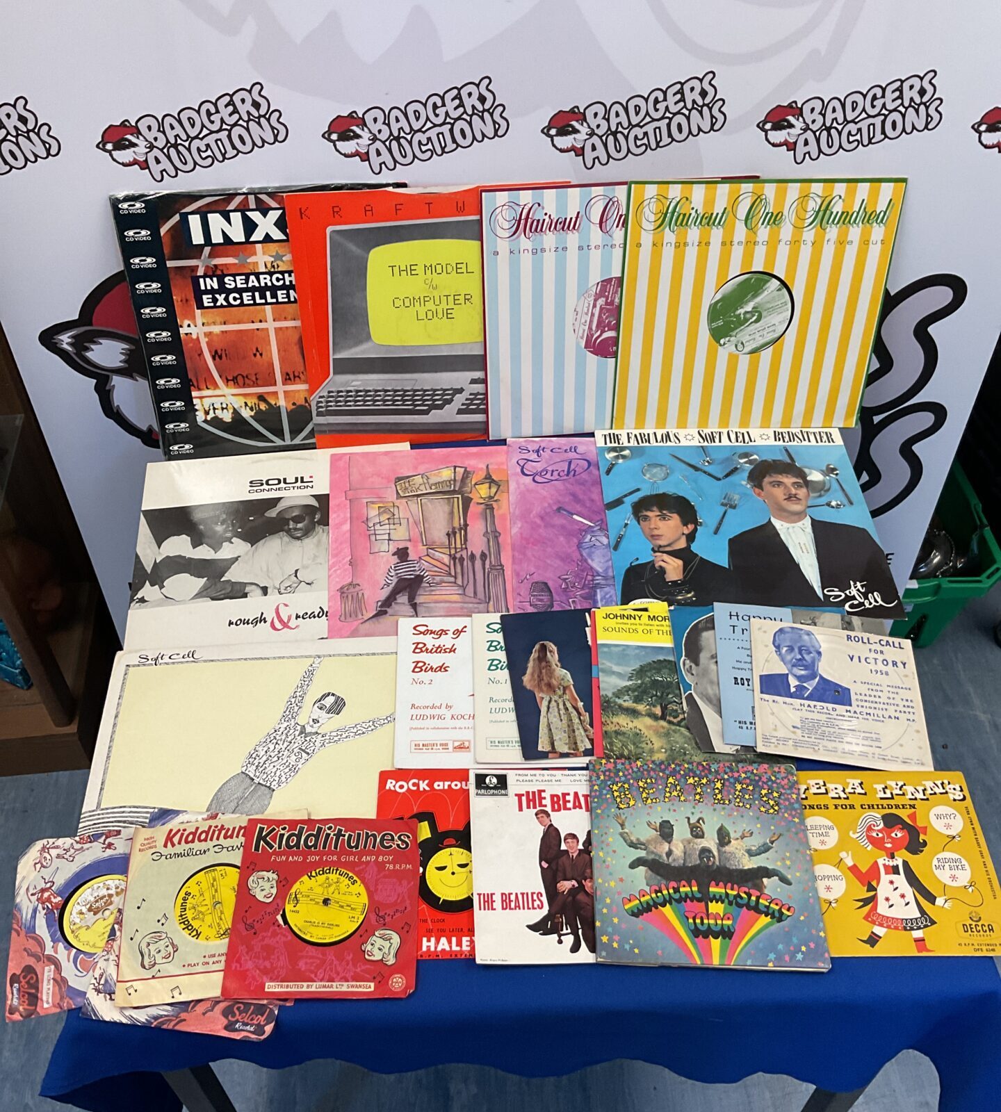 Selection of 12” & 7” vinyl records including inxs video cd, the beatles & softcell