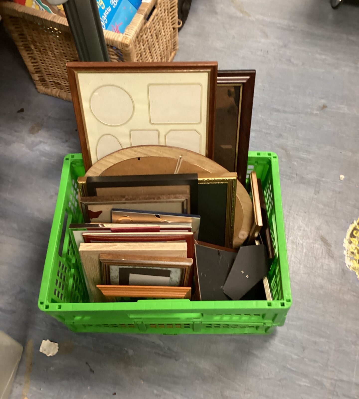 Crate of mixed picture frames