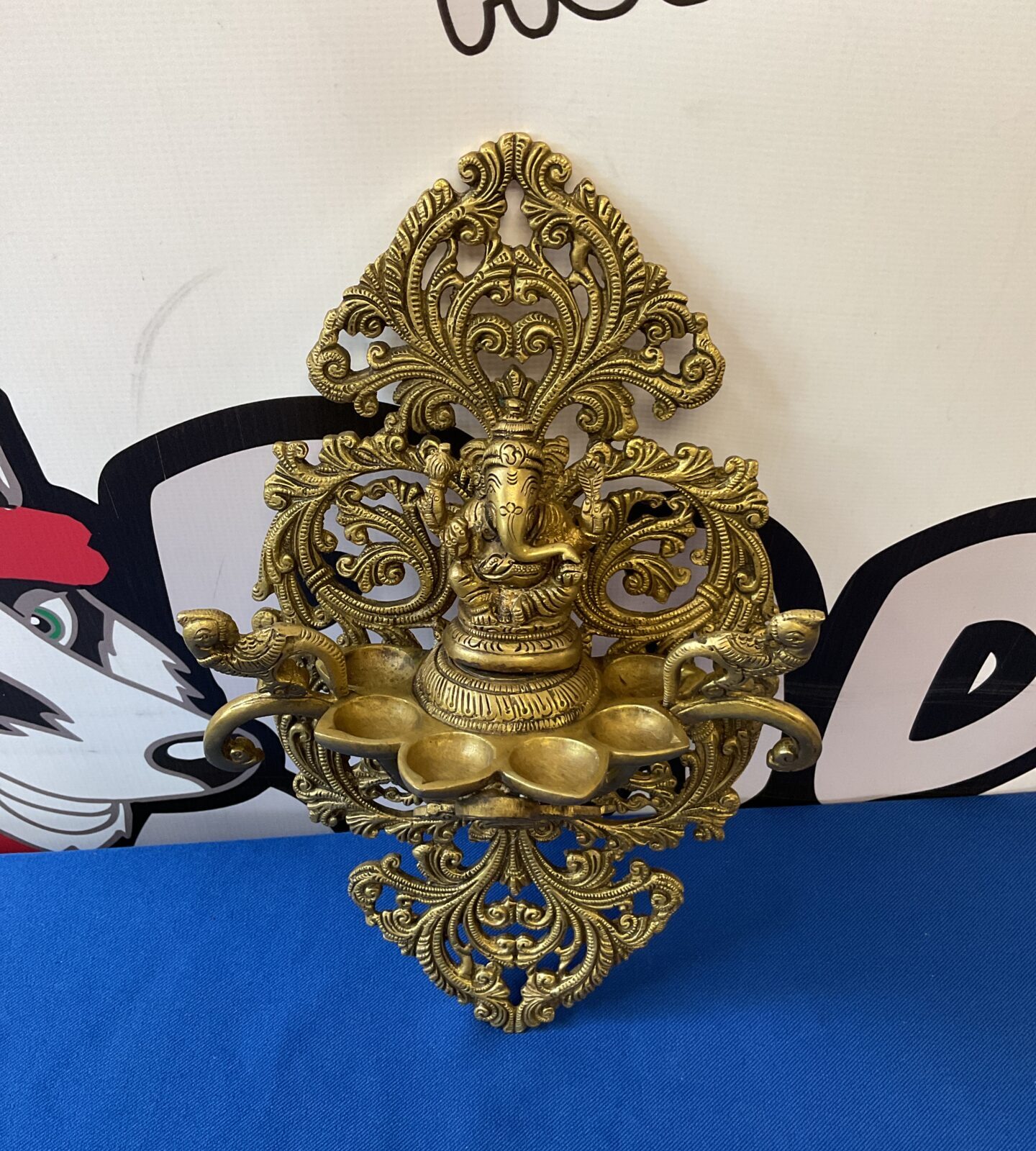 Brass hindu god vishnu wall sconce