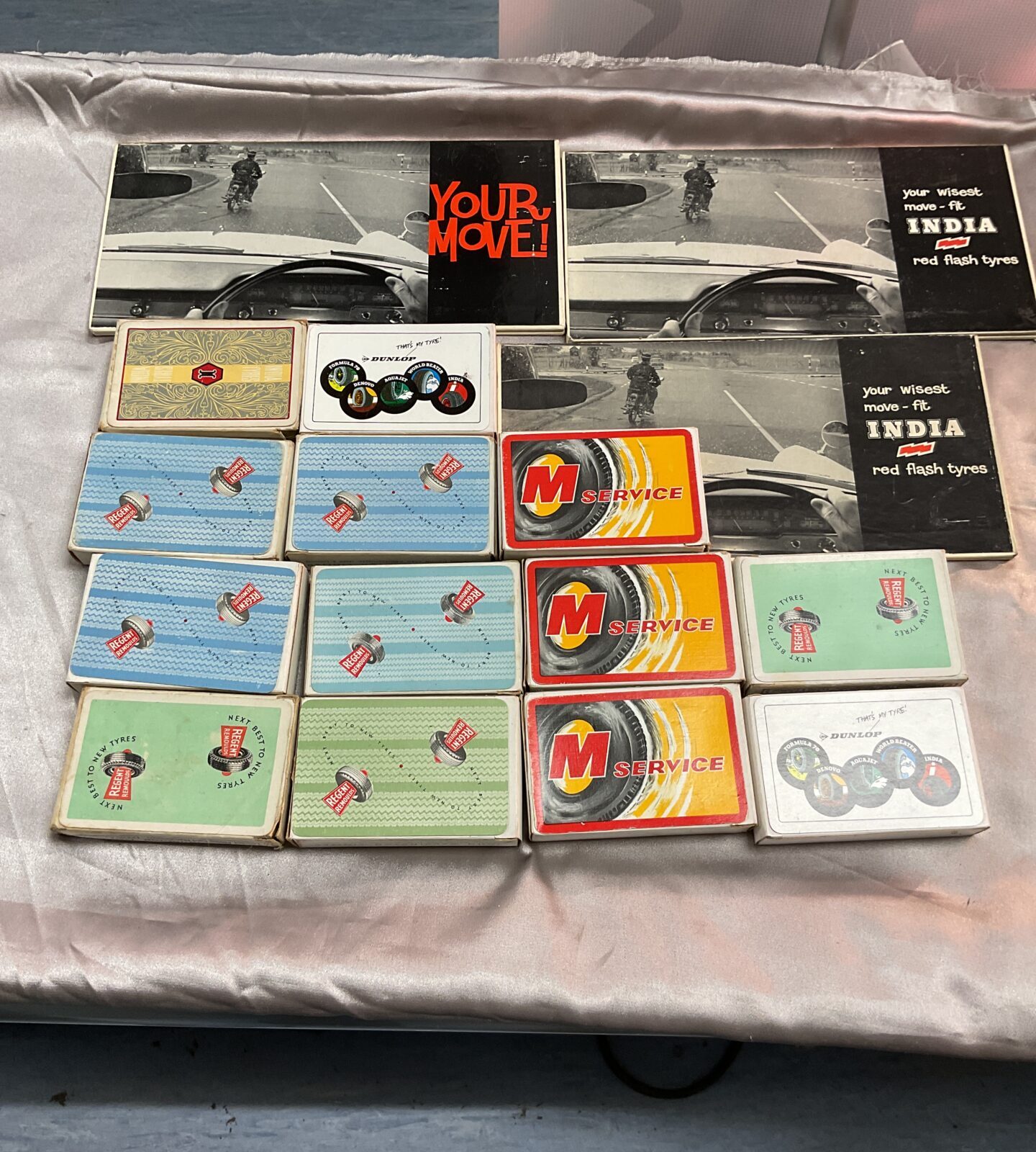 Collection of vintage tyre Advertising signs and playing cards