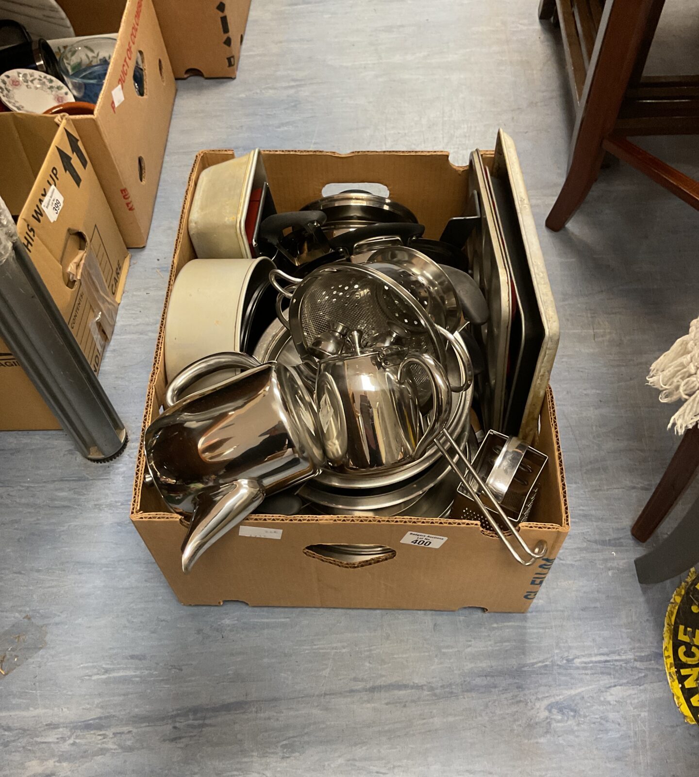 Box of mixed crockery and kitchenware inc pots, muffin tins and more