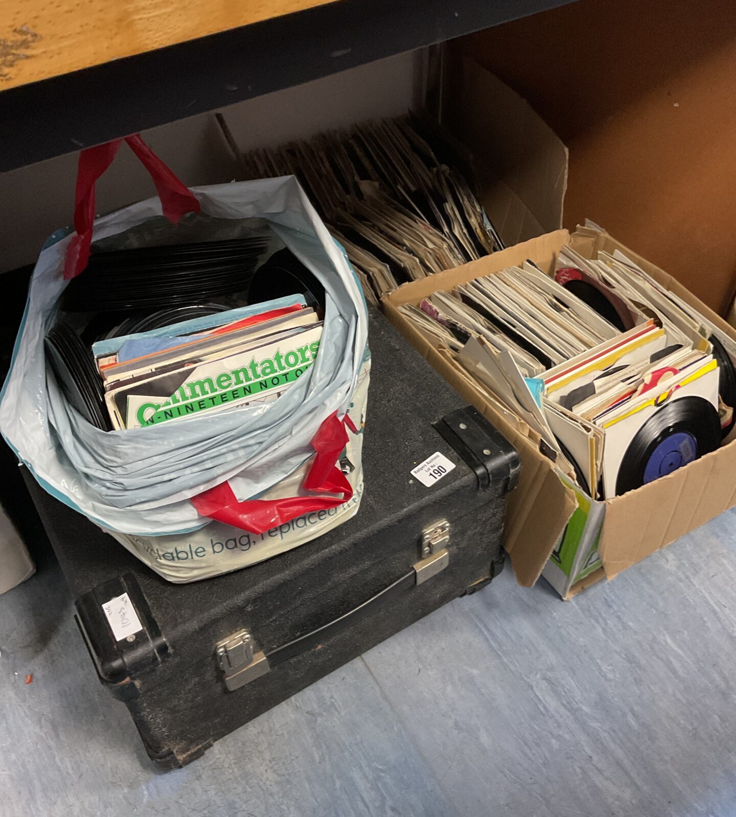 Large collection of 7” single vinyl records with dj case