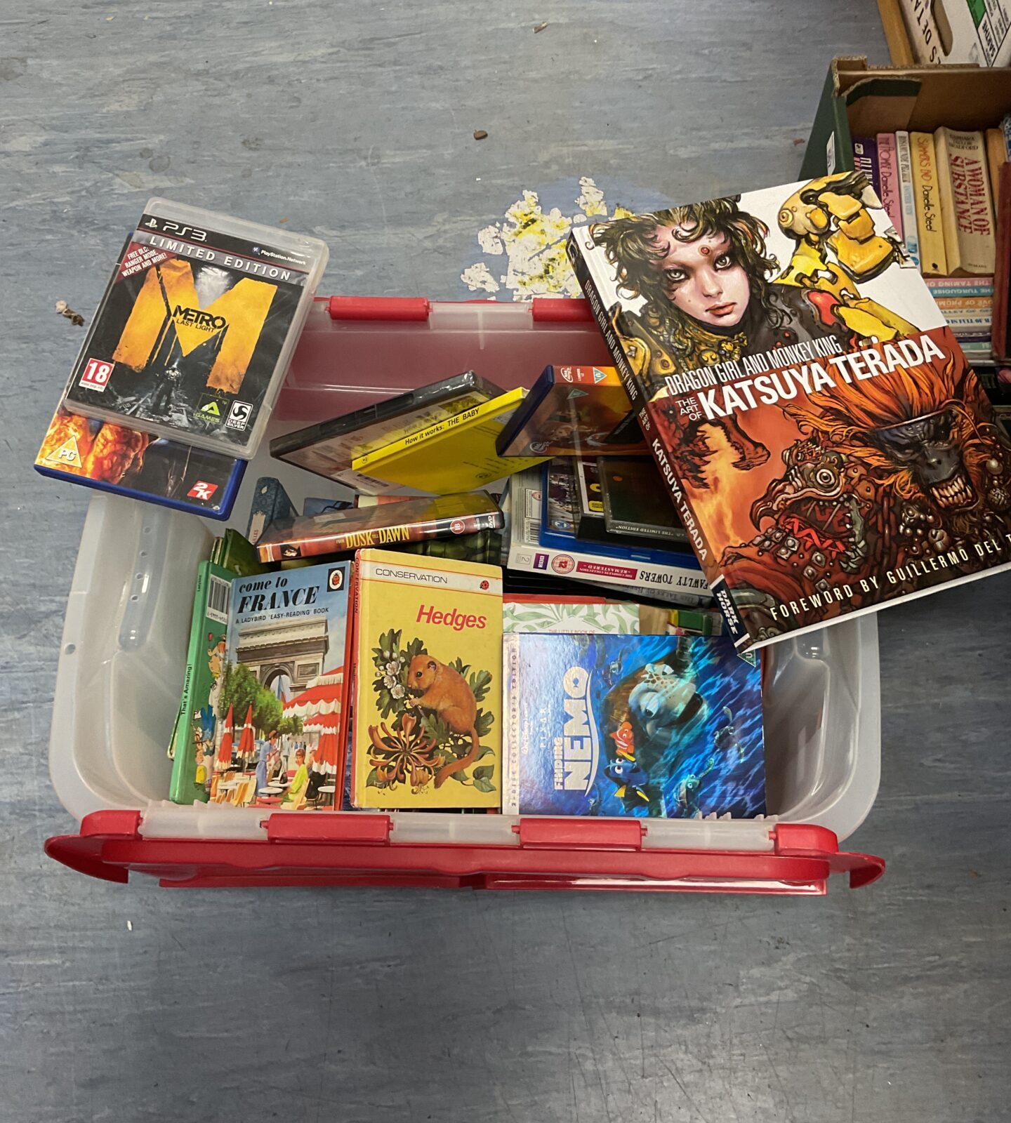 Box of vintage books including ladybird & dvds