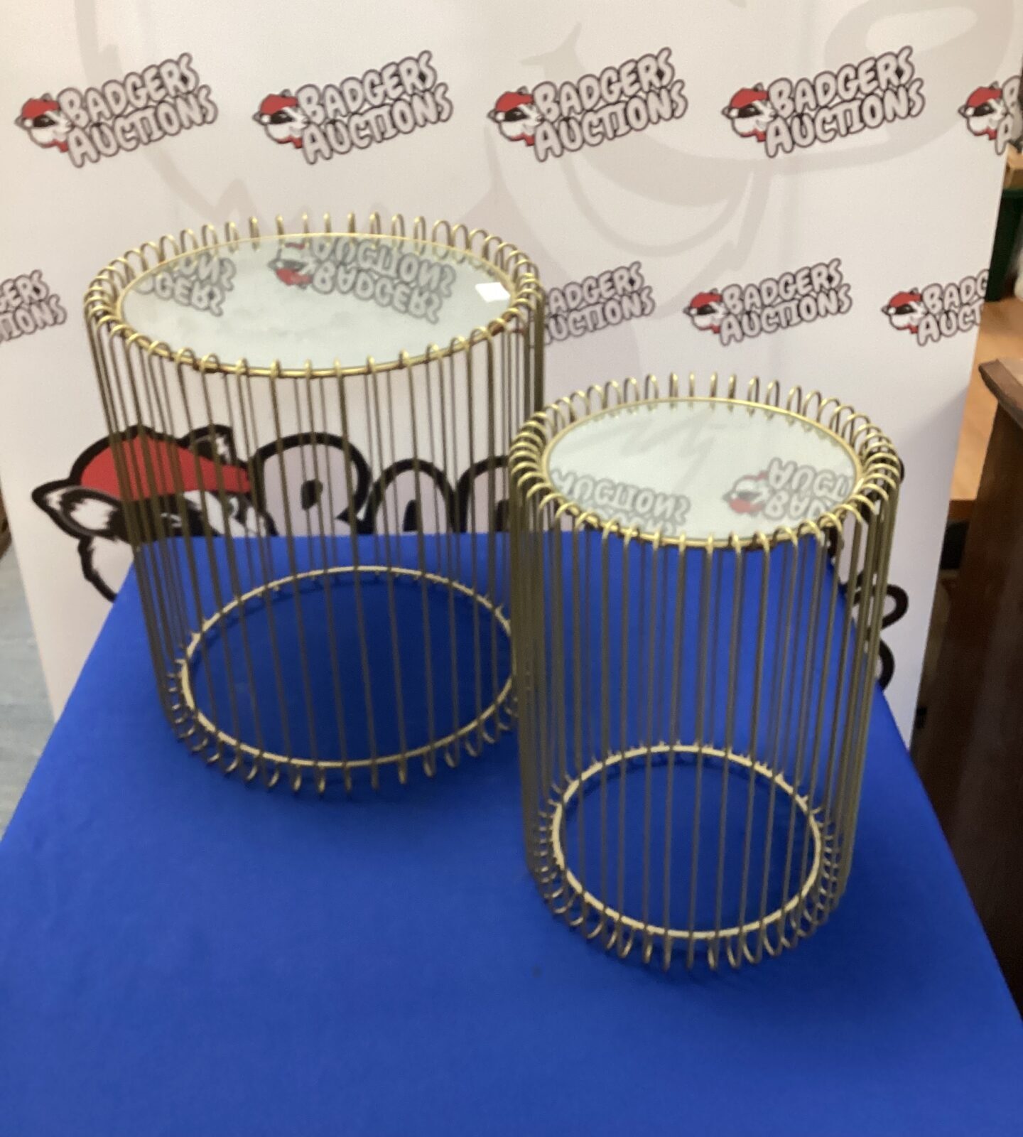 two metal mirror topped table