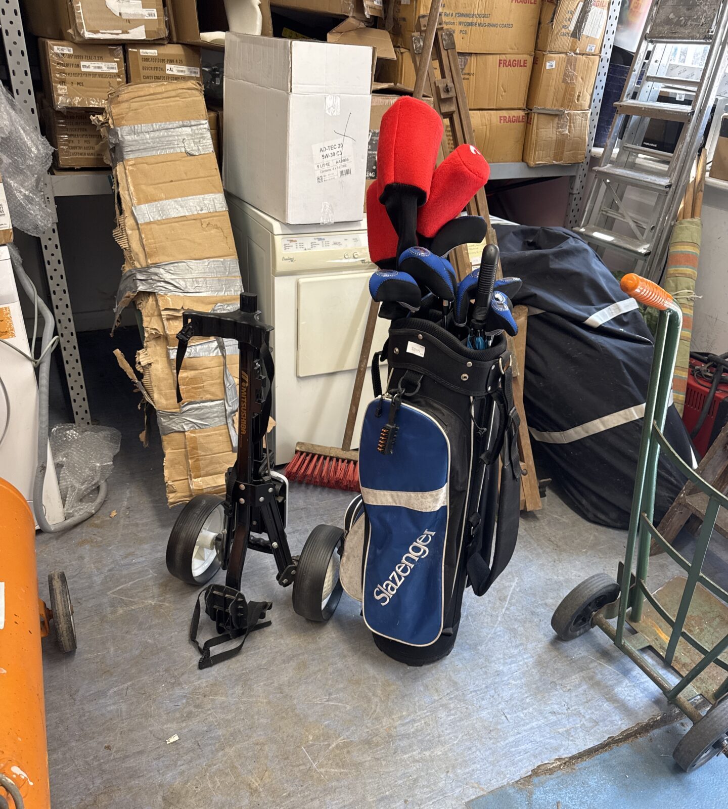 Set of Slazenger fire steel v1 golf clubs inc irons, woods & putter with mitsushiba folding trolley