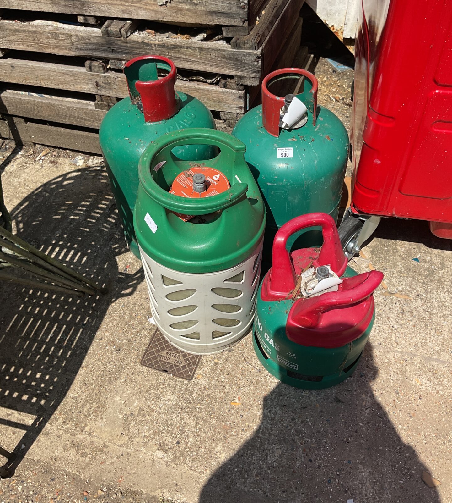Four gas bottles with contents inc calor
