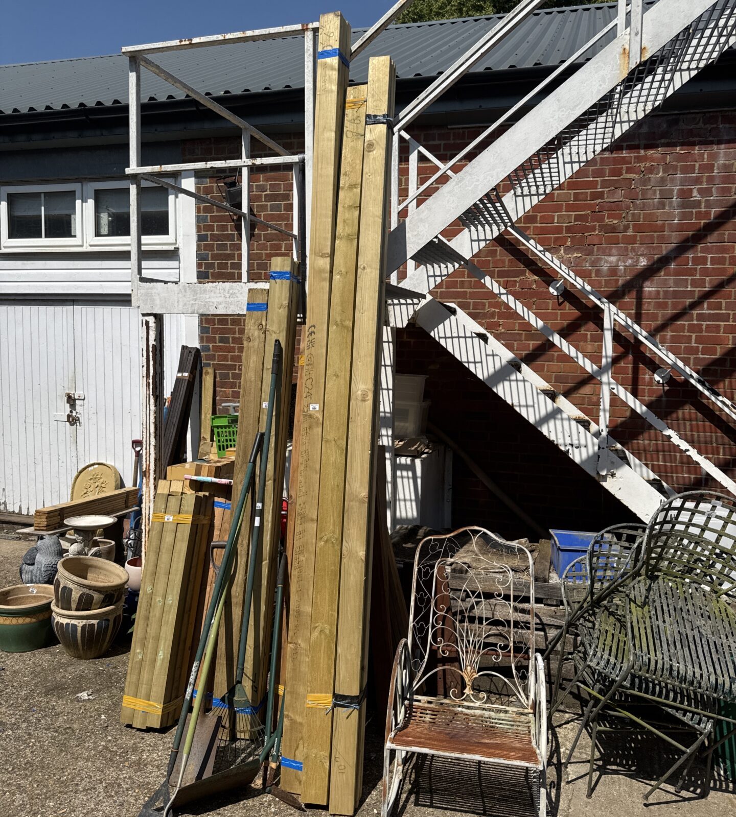 Three bundles of three lengths of timber measuring 9’6”, 10’ & 10’6”