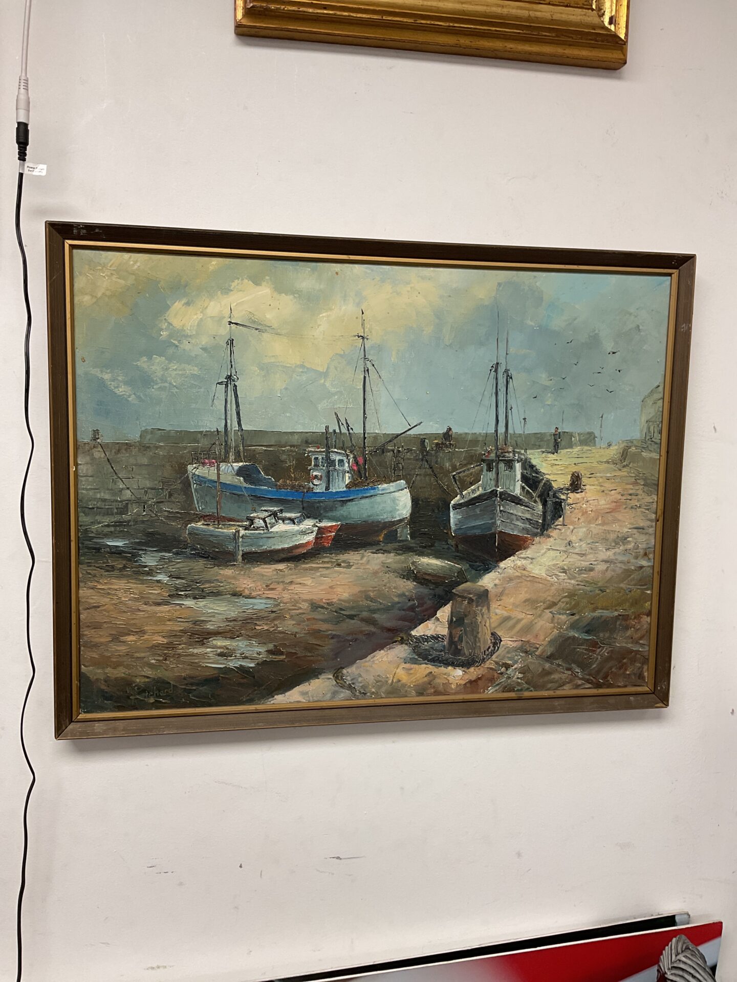n s pritchard oil on canvas of boats in harbour at porthleven