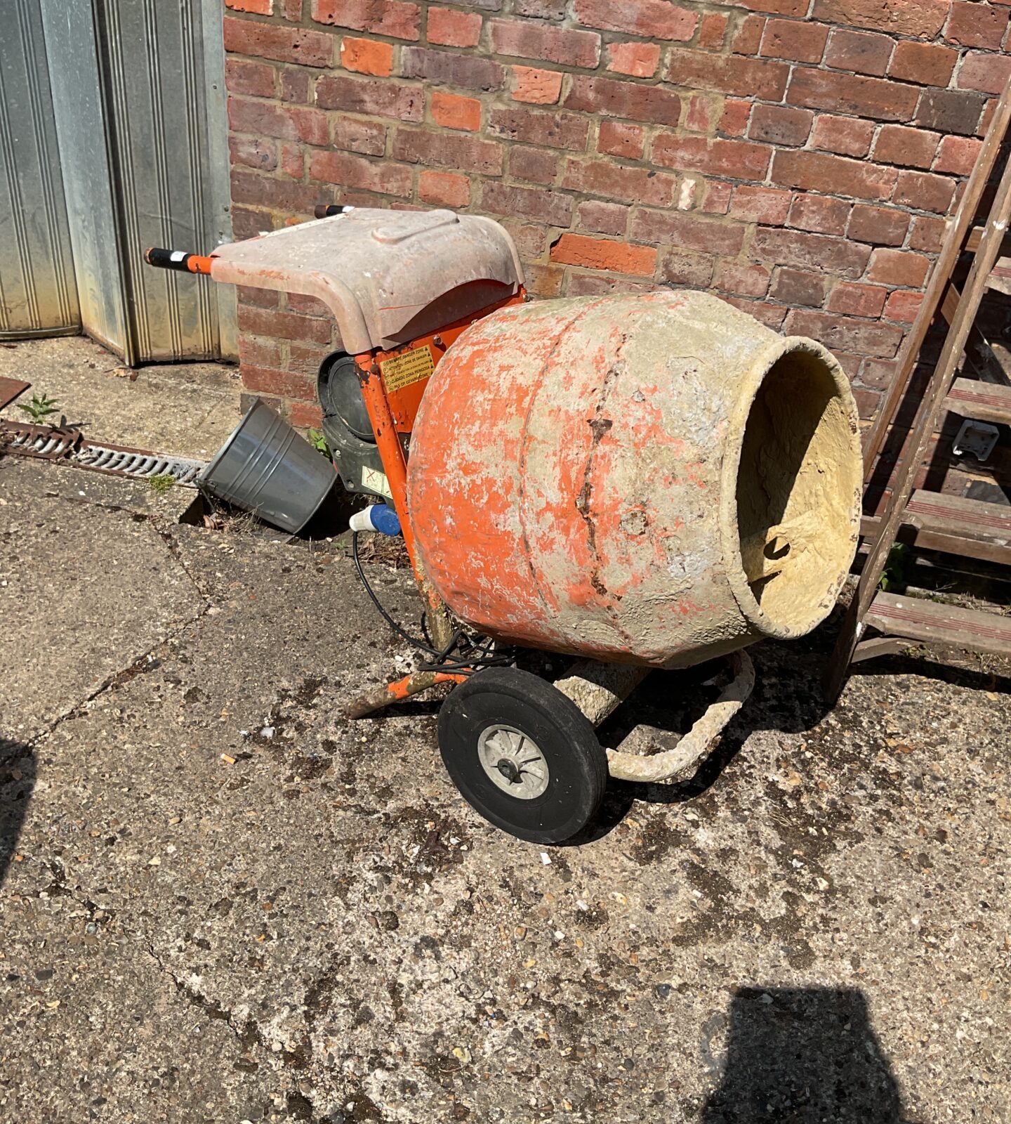 Belle cement mixer working