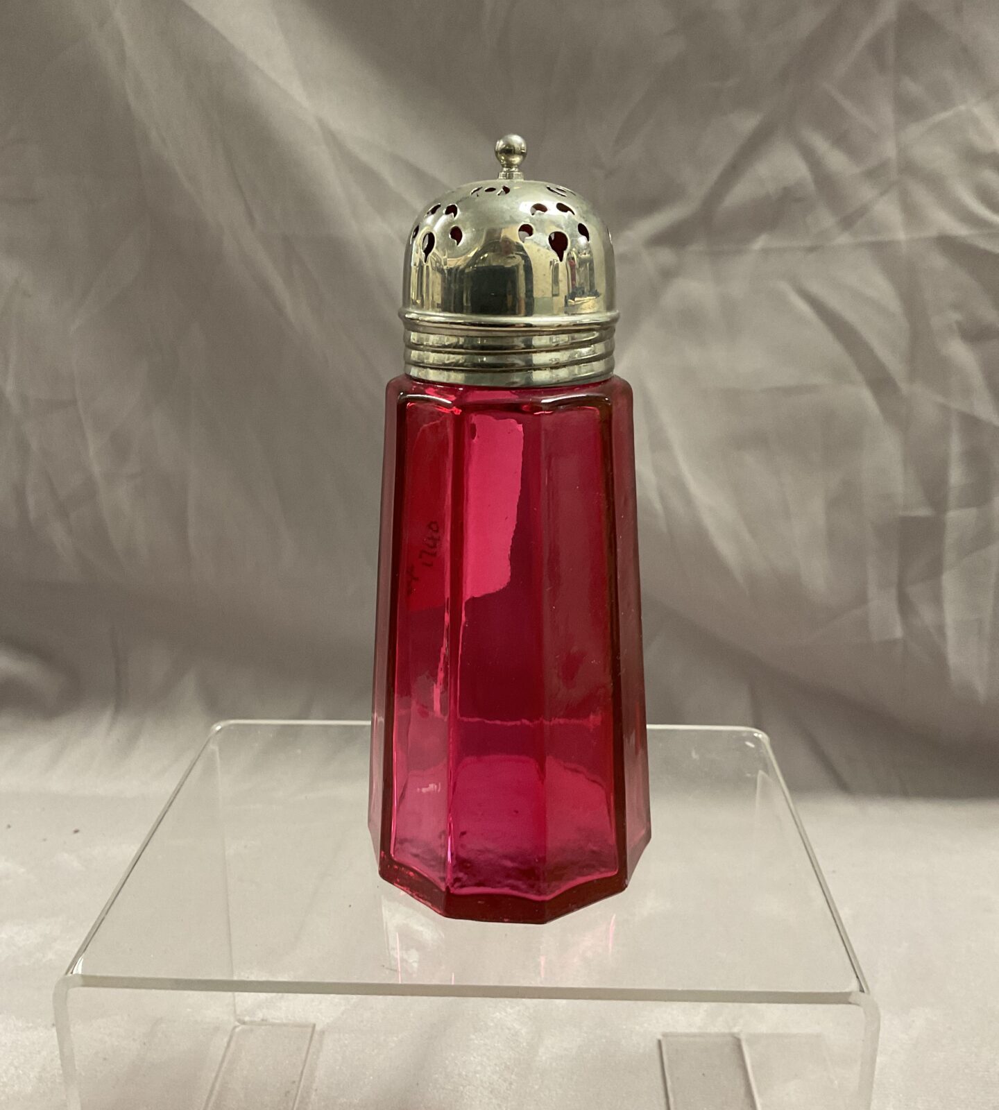 Antique cranberry glass sugar sifter