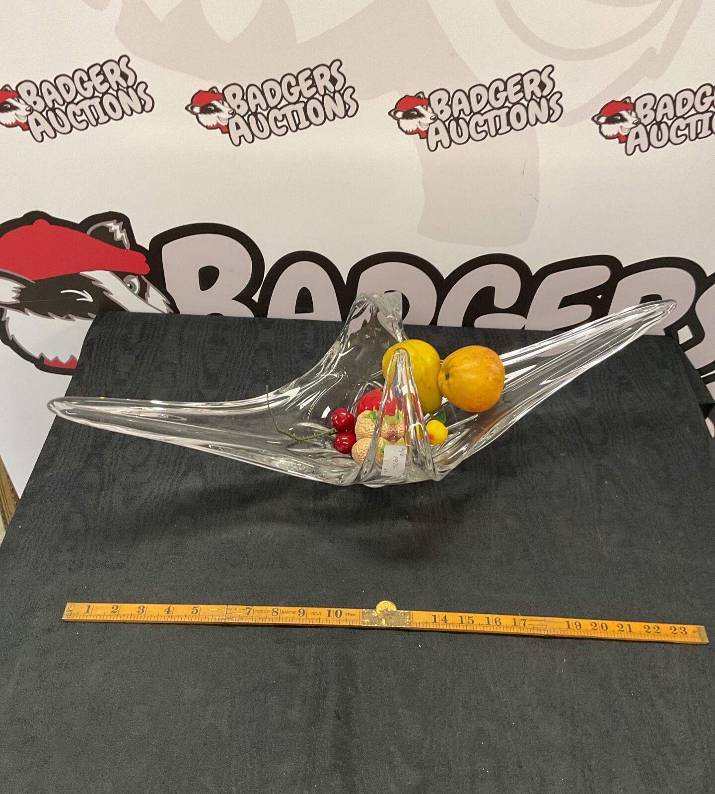Large Slash glass bowl with artificial fruit