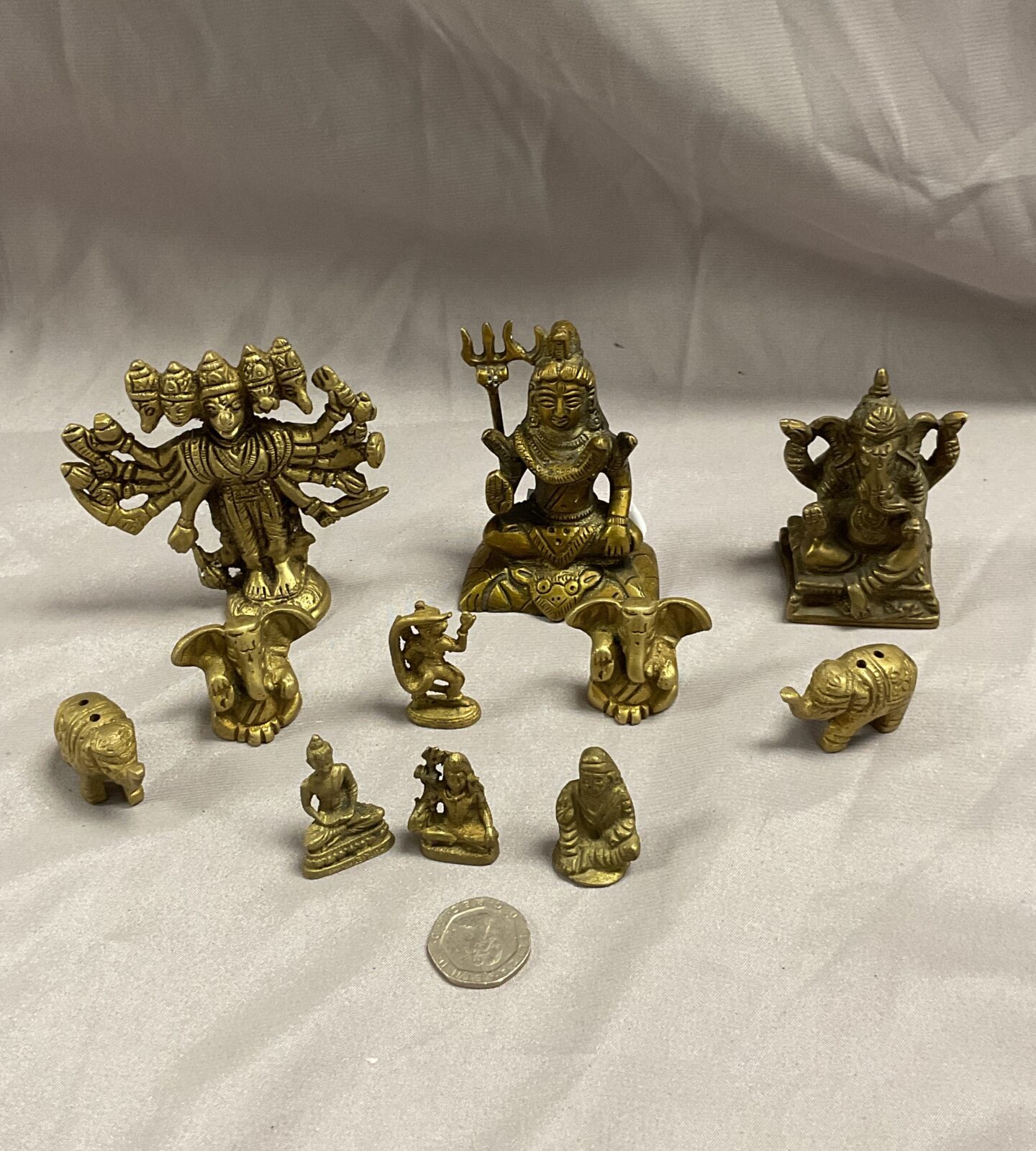 Collection of brass miniature Indian Daieties