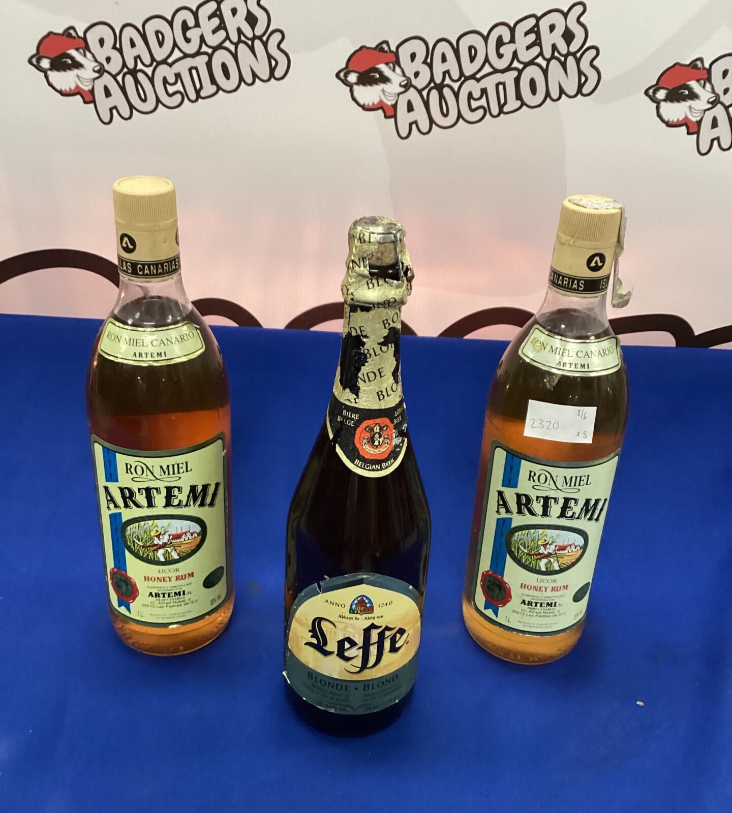 Two bottles of Artemi Honey Rum and Blonde Beer