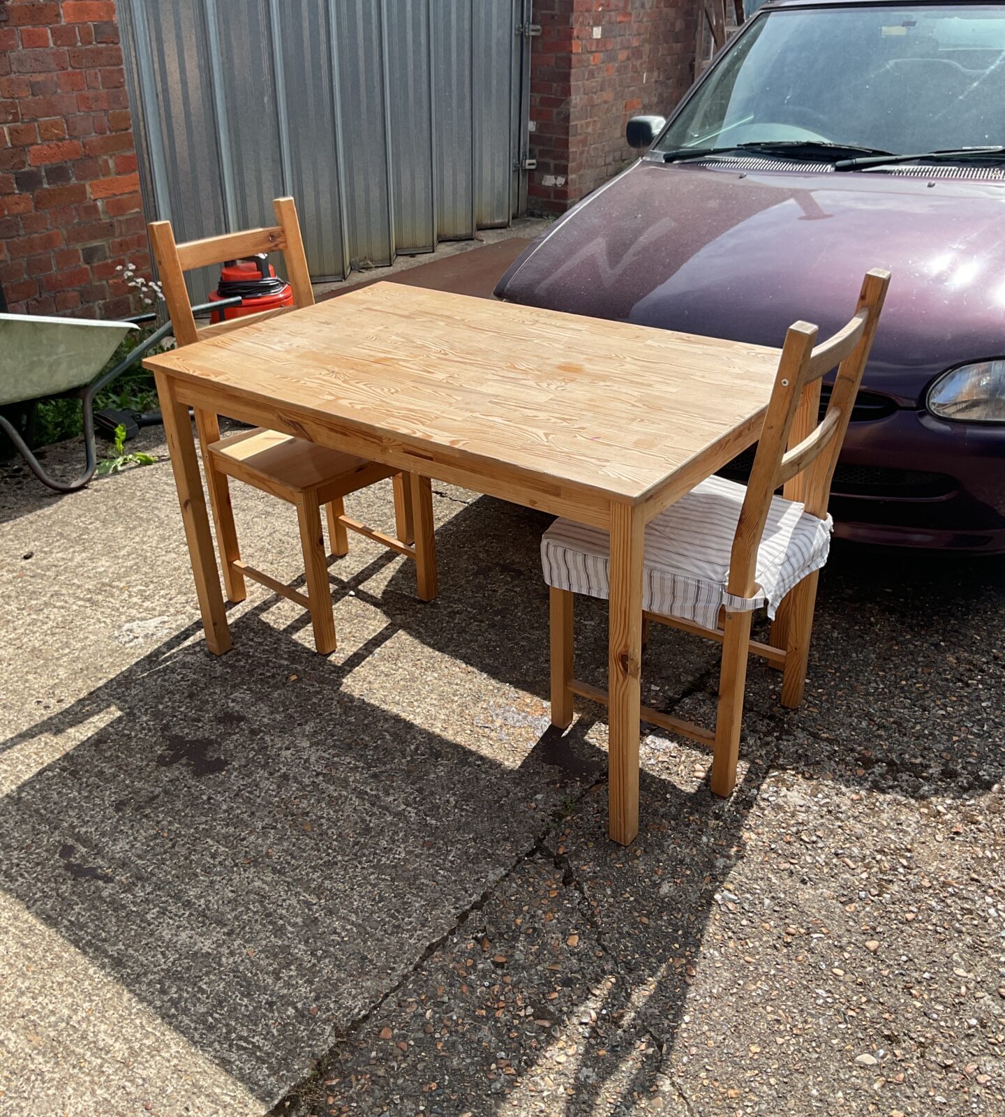 Pine kitchen table and two chairs