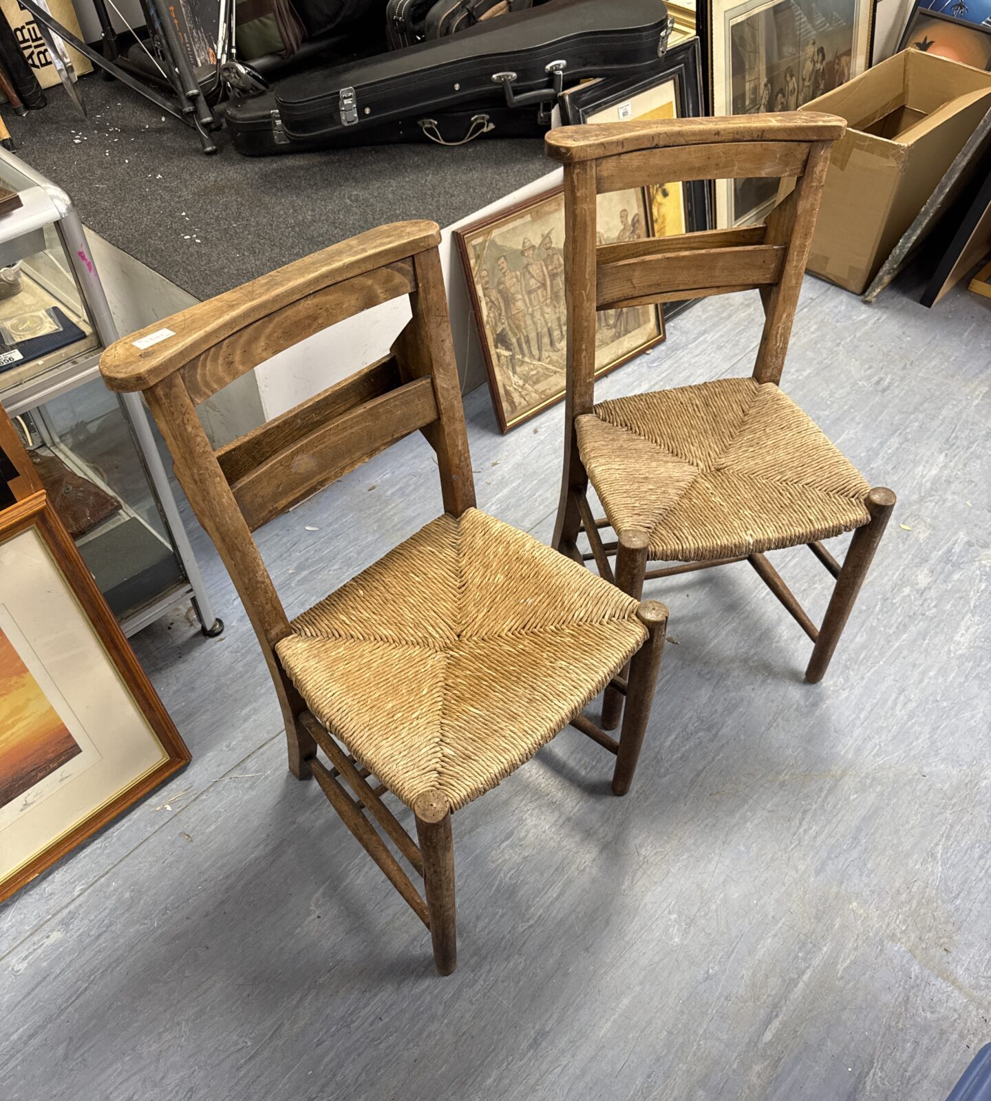 Two antique chapel chairs