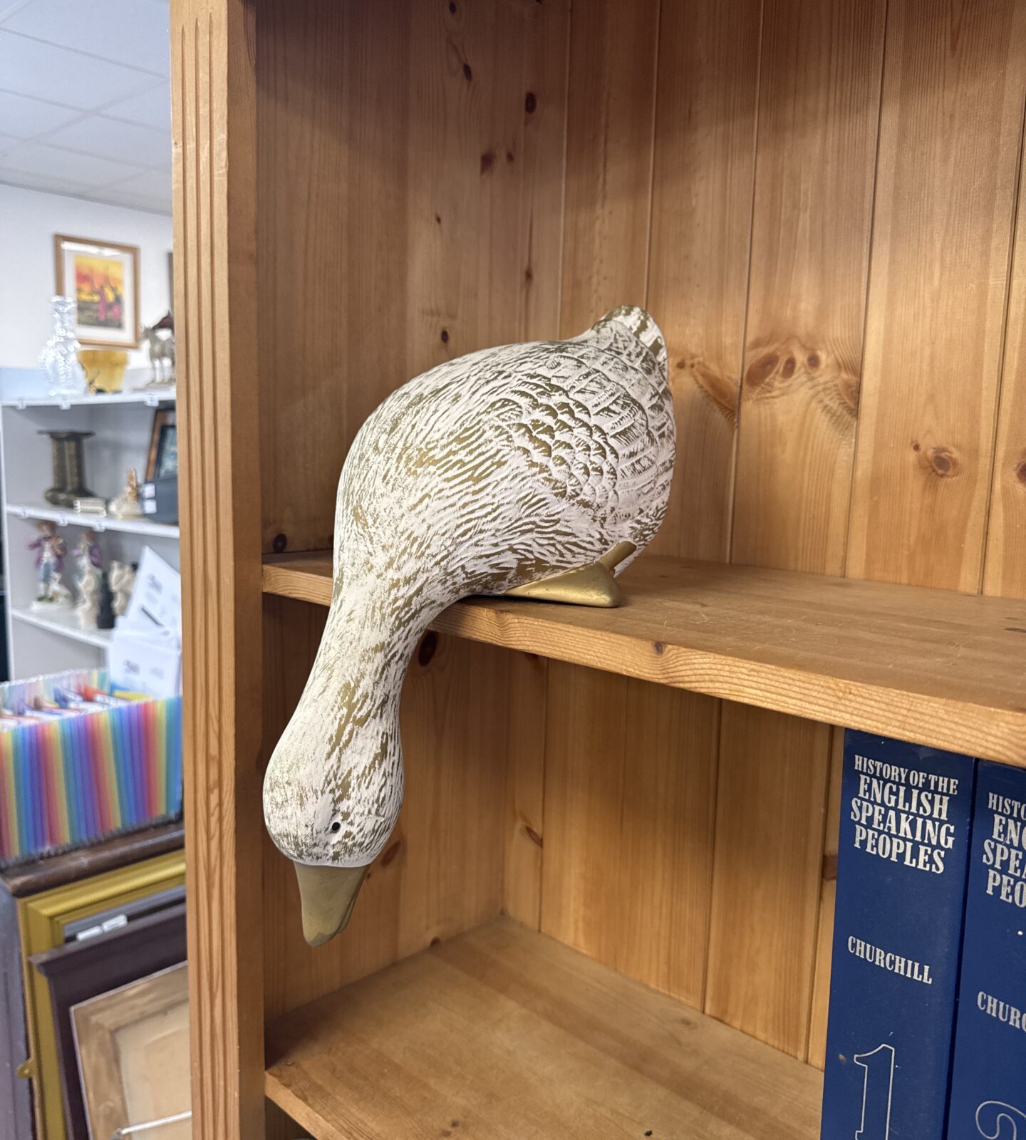 Porcelain shelf standing duck with drooping head
