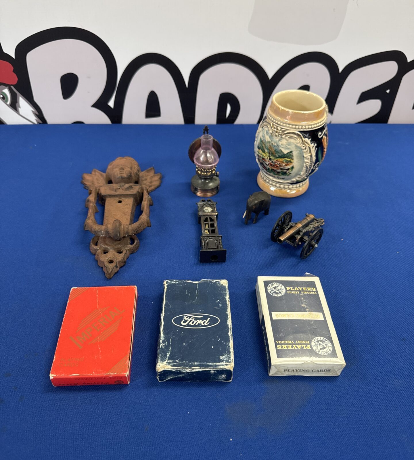 Selection of curios inc vintage door knocker, novelty pencil sharpeners, playing cards & others