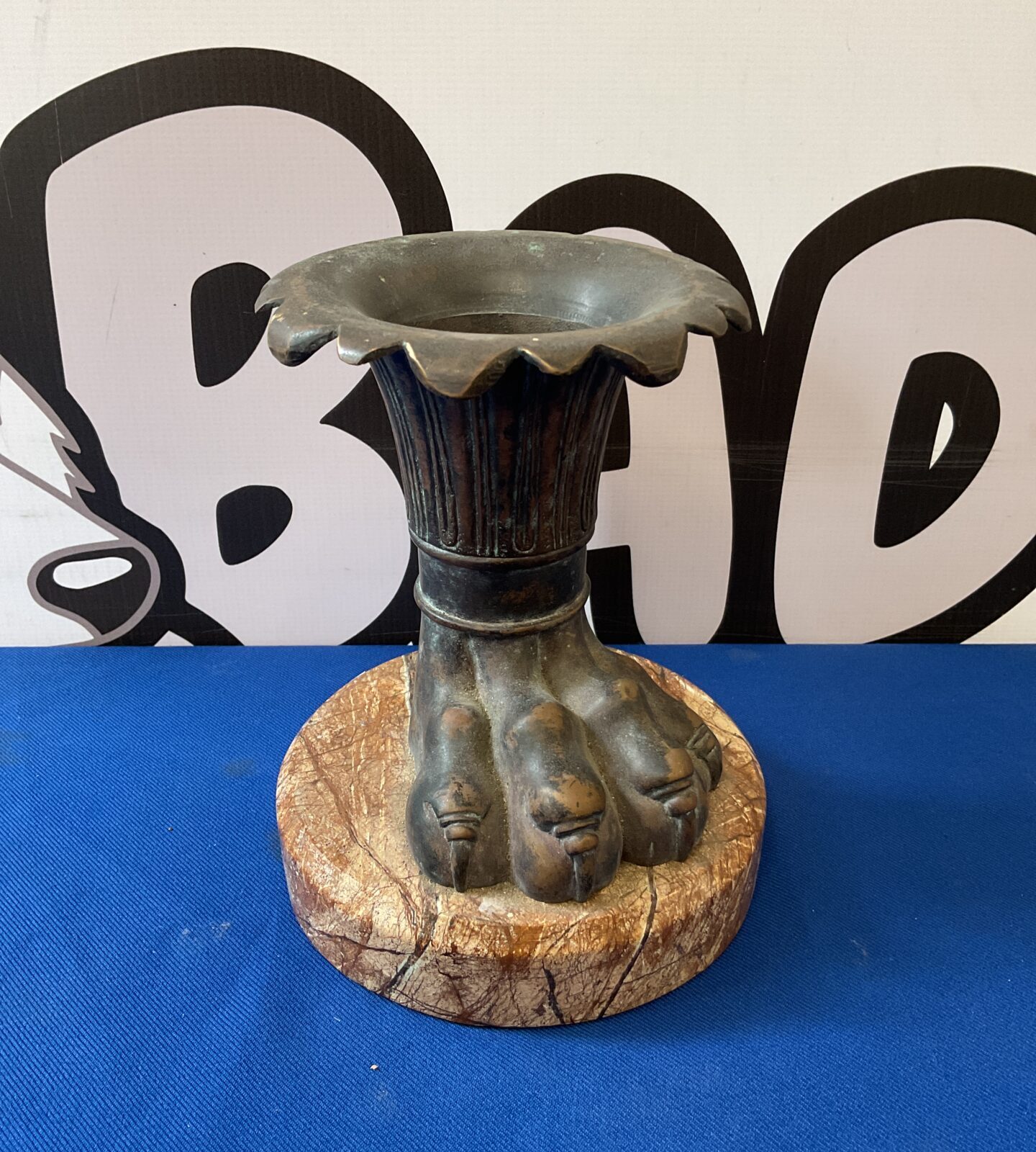Vintage bronze lion foot vase on marble base
