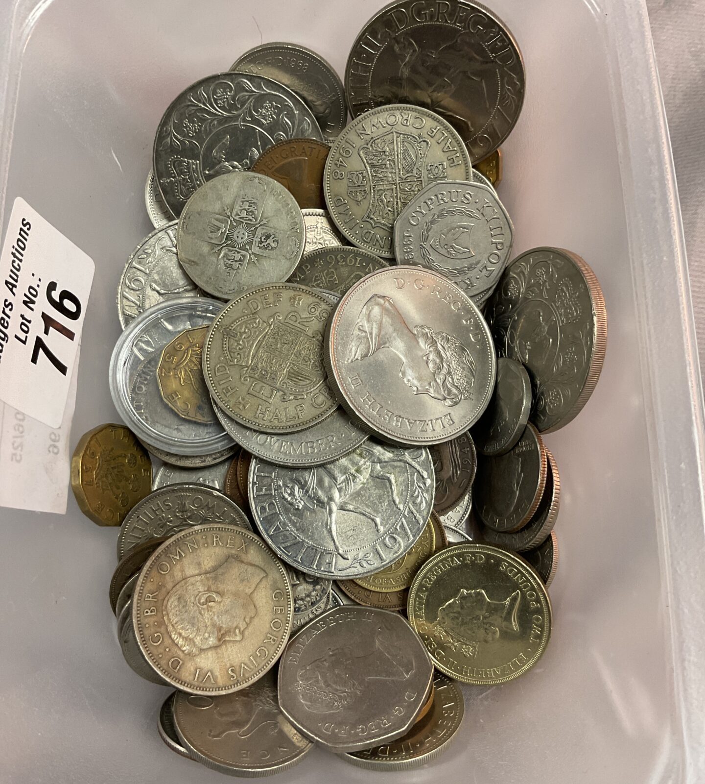 Tub of assorted coins