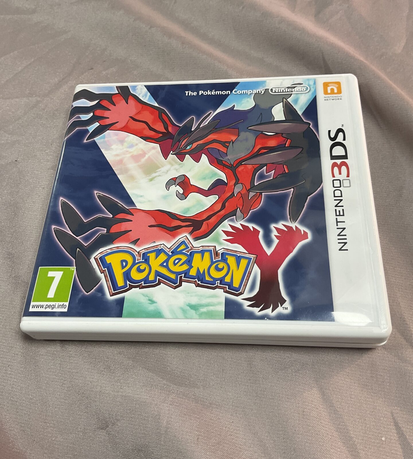 Nintendo 3DS Pokemon game cartridge in box with instructions