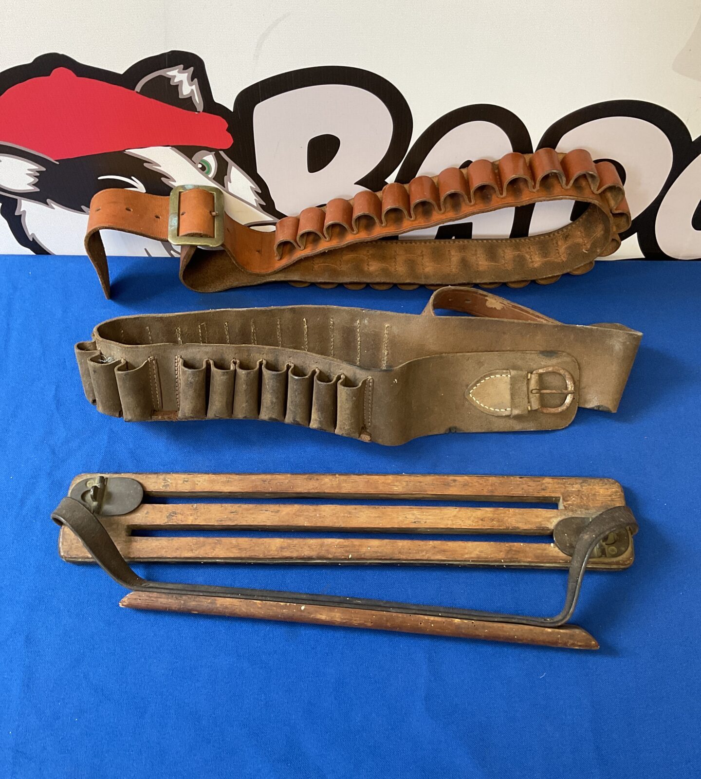 Two vintage cartridge belts & game carrier