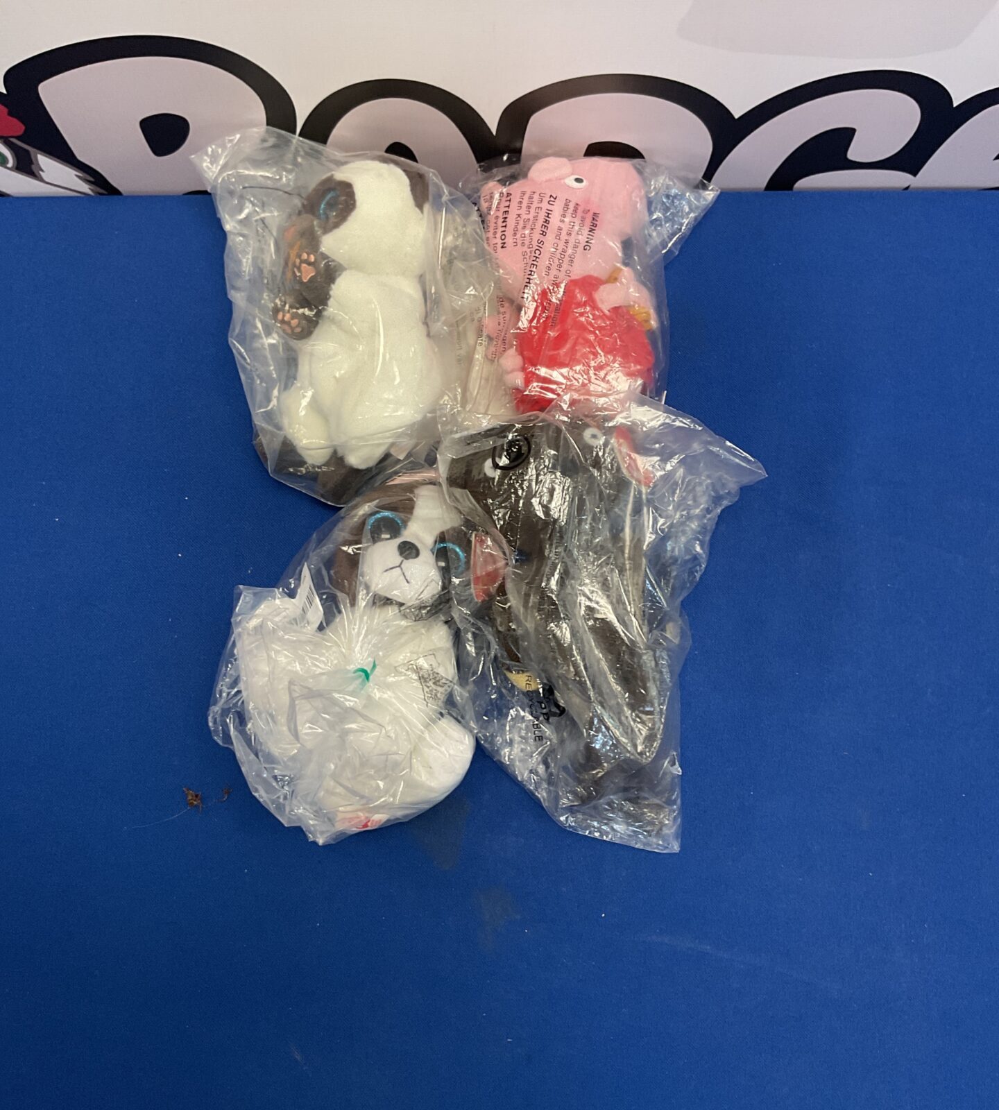 Four bagged ty beanie soft toys