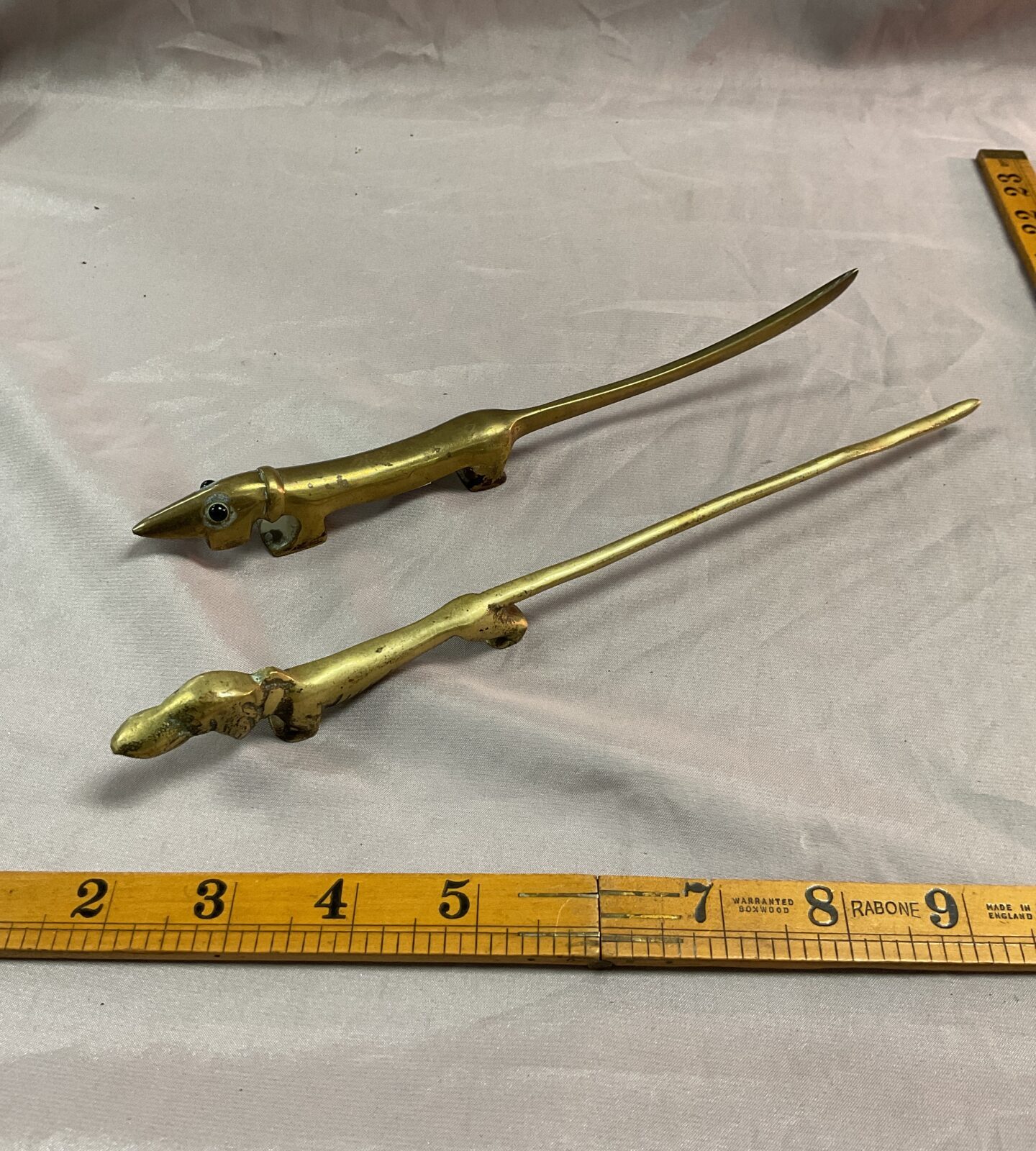Two brass dog letter openers