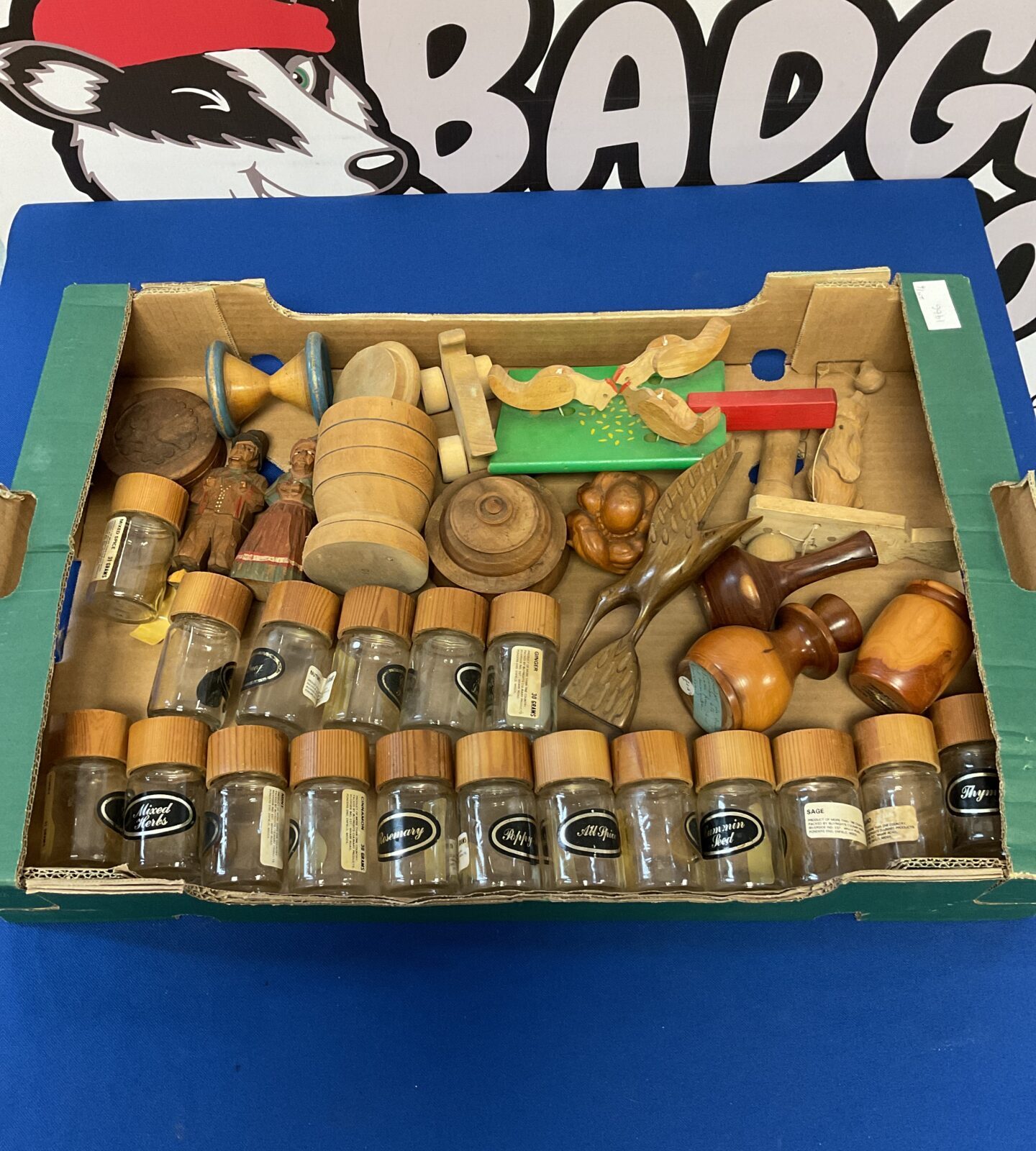 Tray of wooden items including spice jars