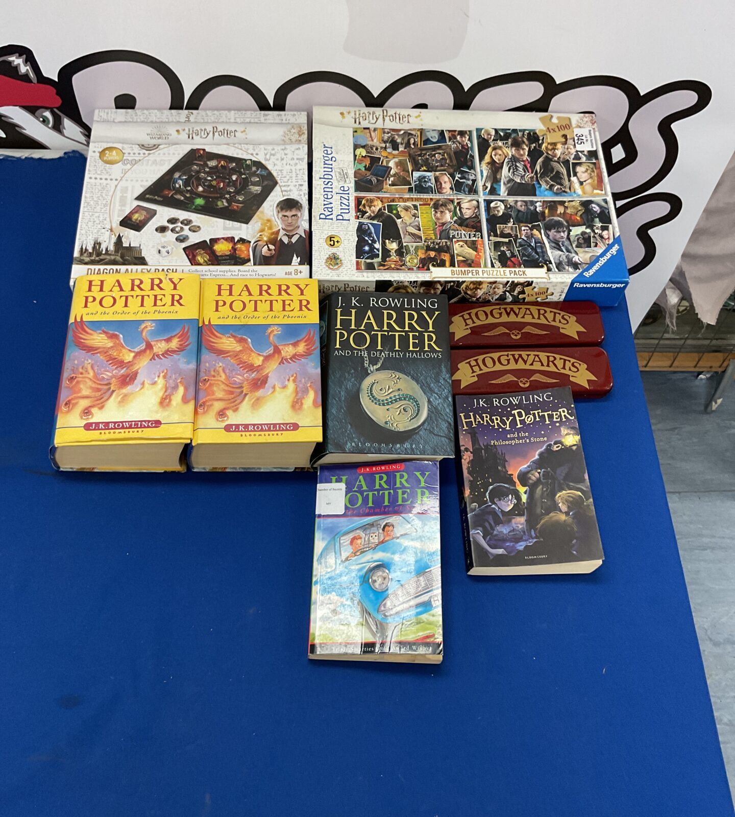 Bag of harry potter items inc puzzle and books inc first editions