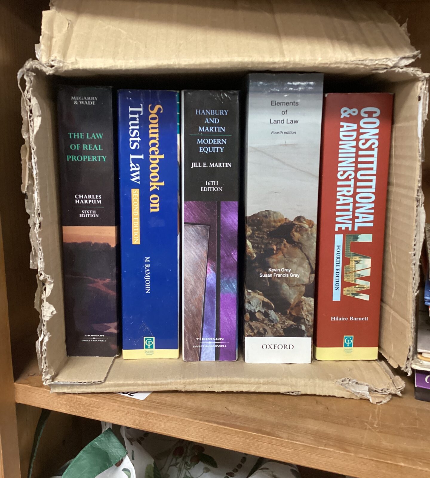 Five law books inc sourcebook on trust law, the law of real property, elements of law, modern law & constitutional & administrative