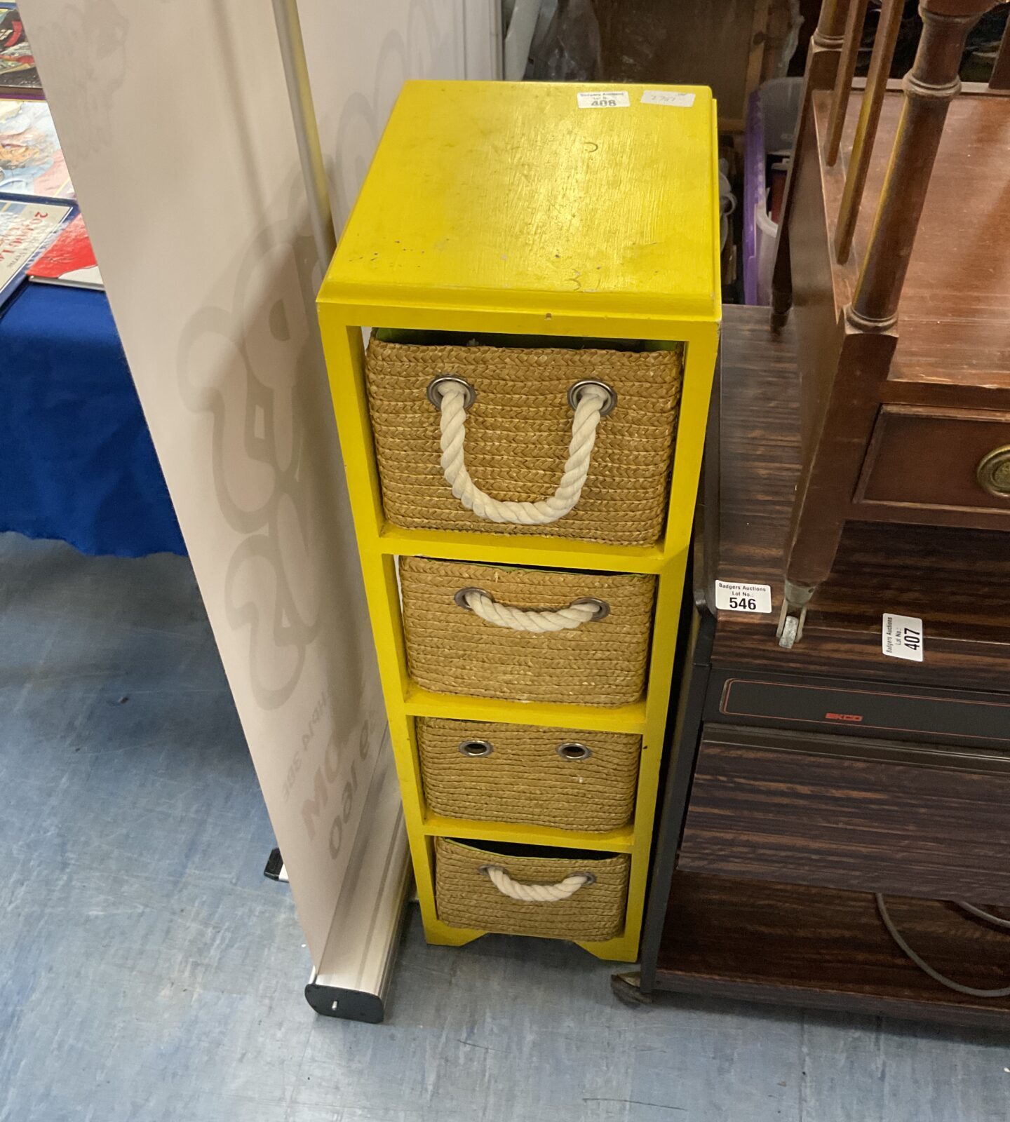 Four draw wicker and yellow storage unit