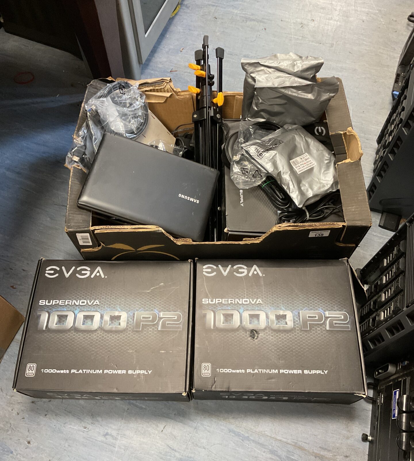 Box of evga supernova 1000 p2 computer power supplies & samsung laptop