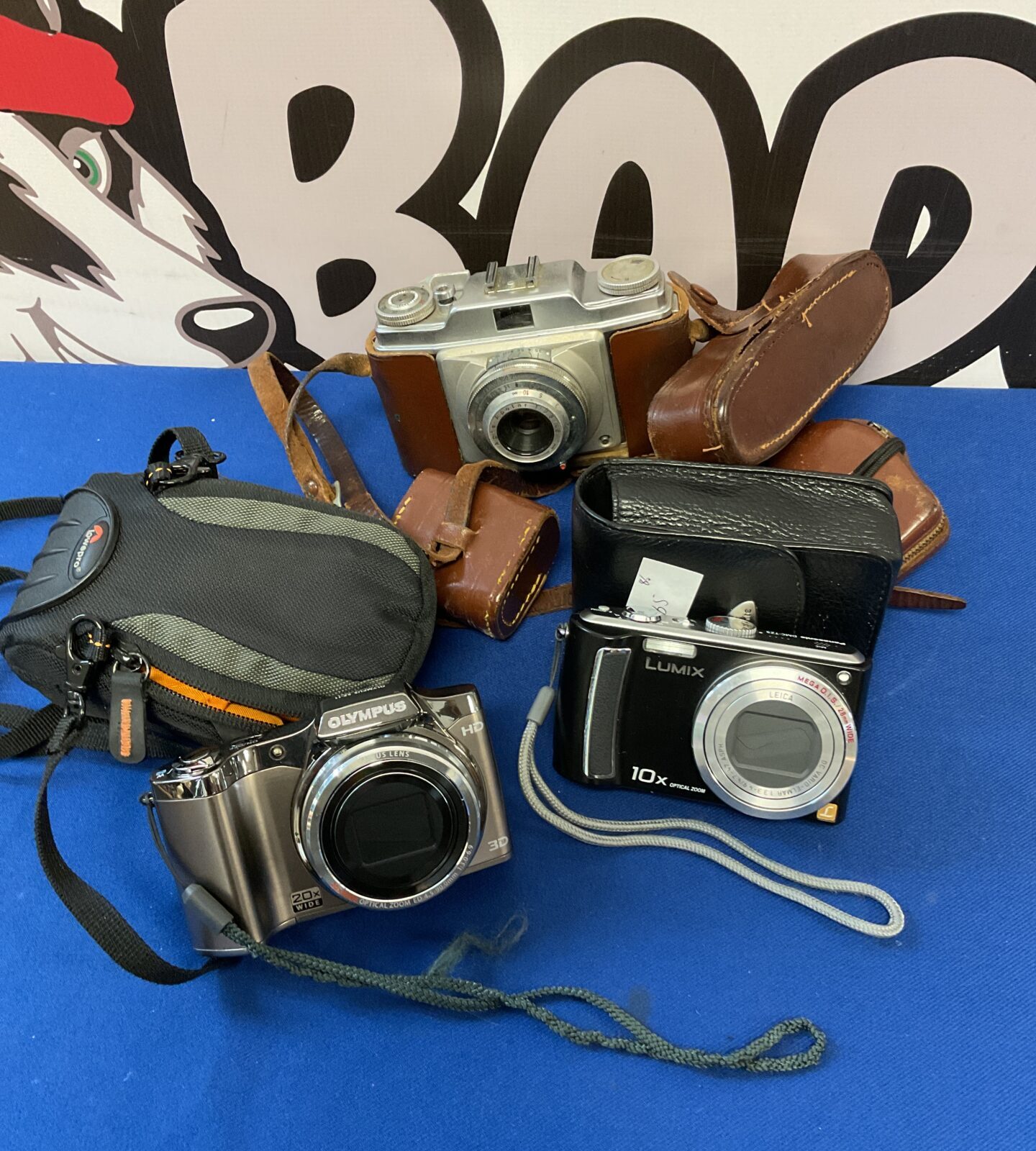 Three cameras including Olympus sz-11 & lumix dmc-tz5