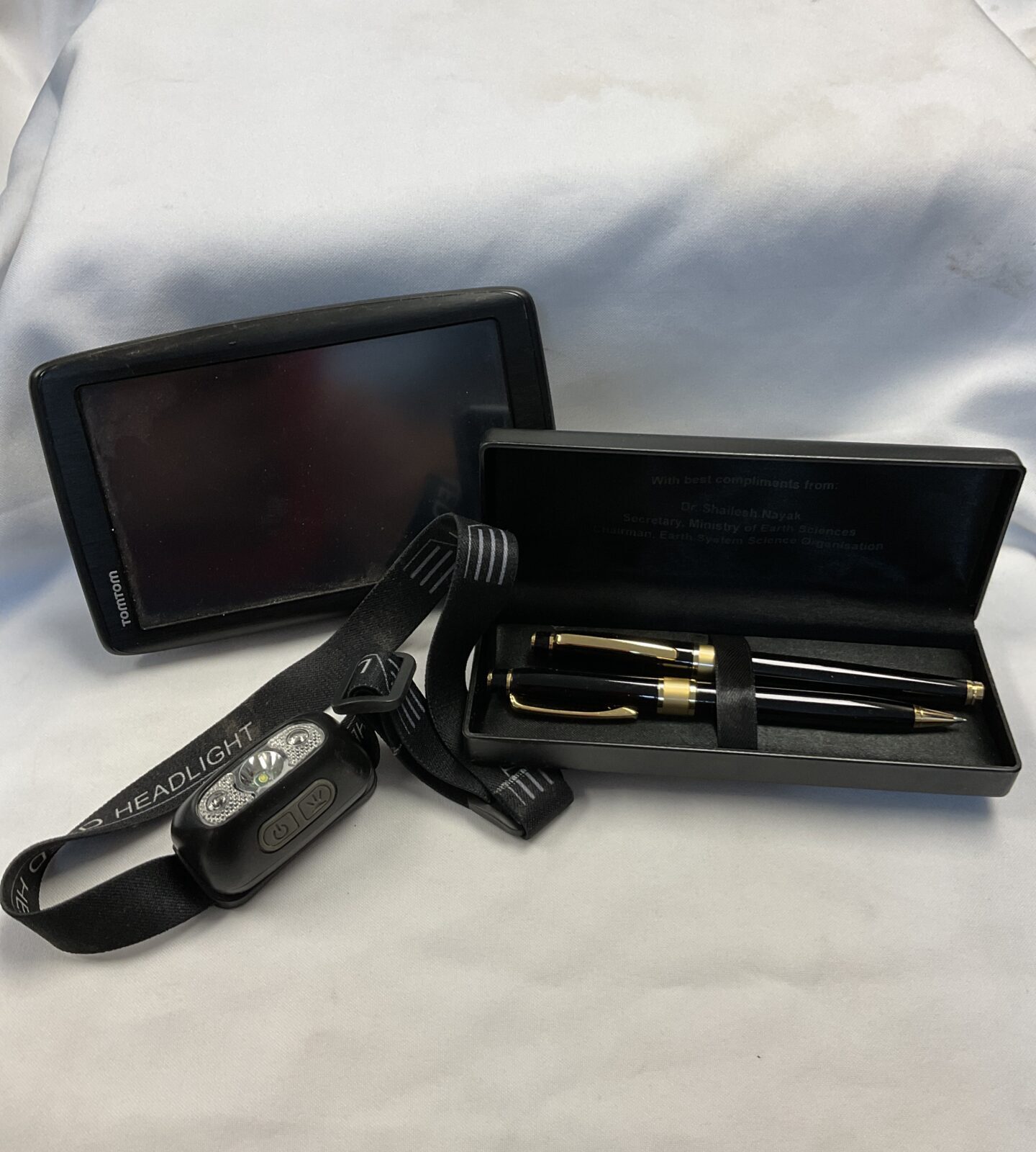 Tomtom satnav, led head torch & pen set