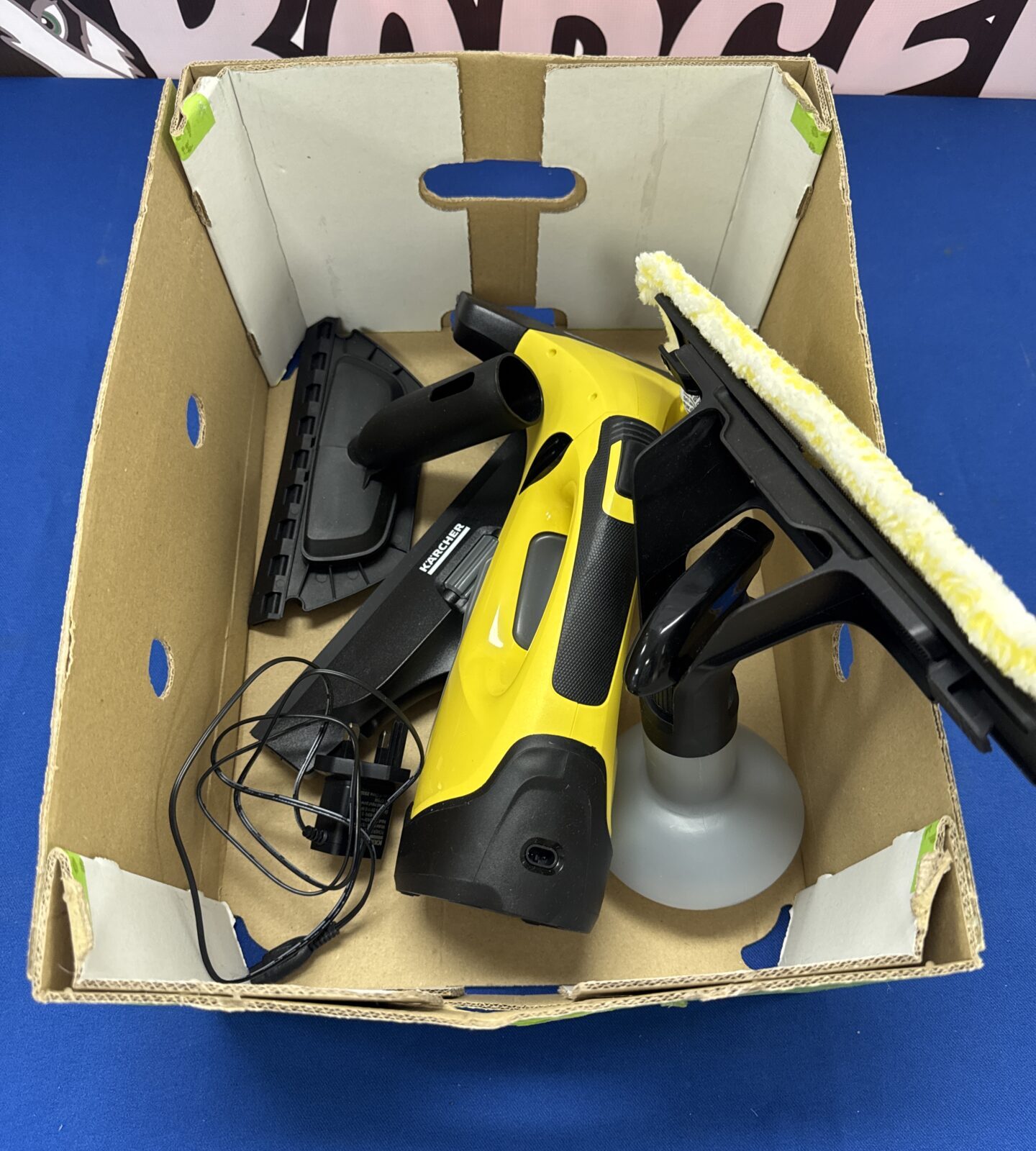 Karcher window vac with charger & attachments (working) with a manual spray bottle window cleaner