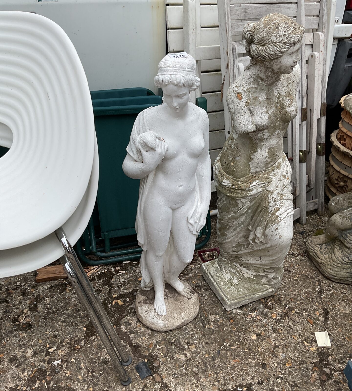 Garden stone ornament of nude lady with dove