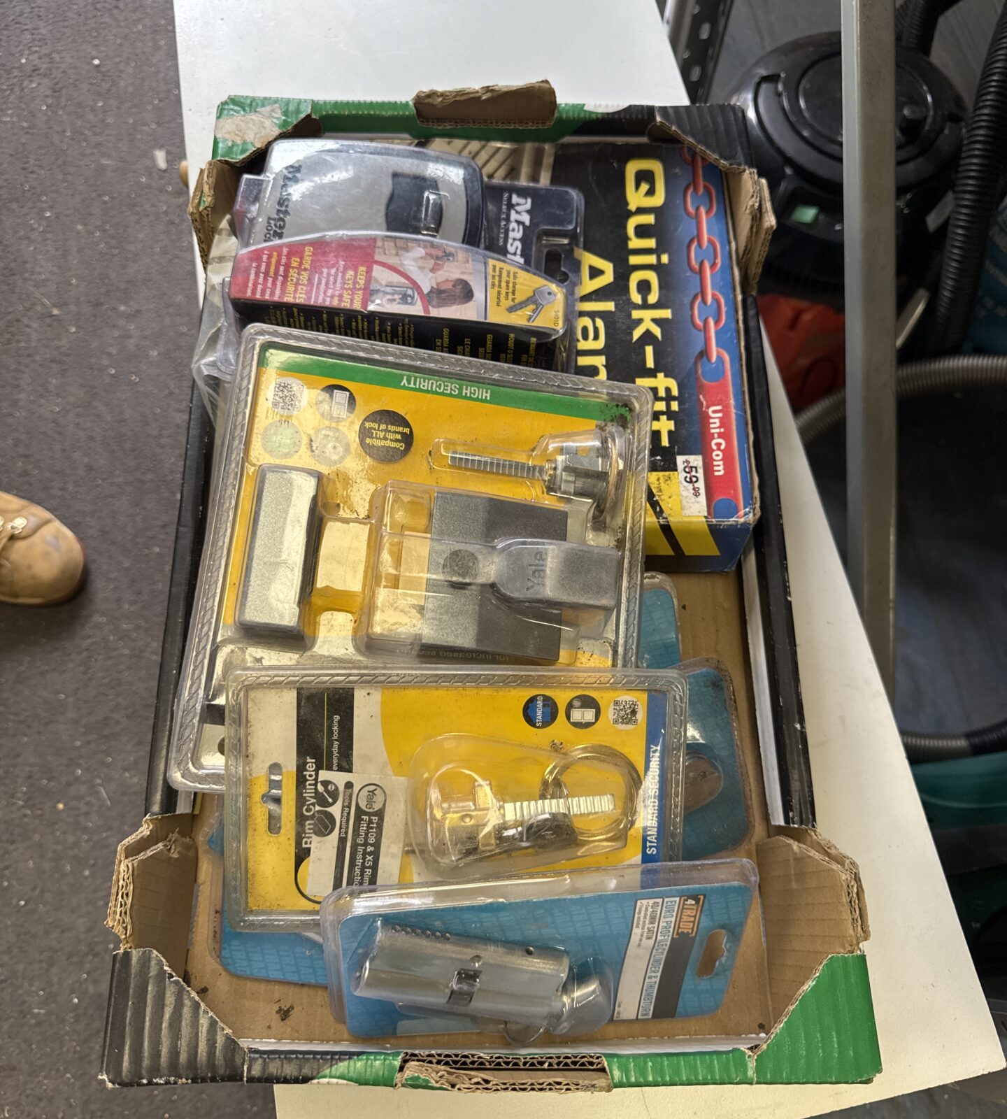 Box of assorted locks & an alarm system