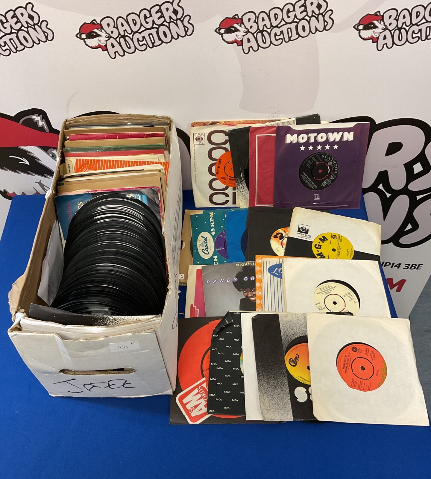 Box of 7” single vinyl records