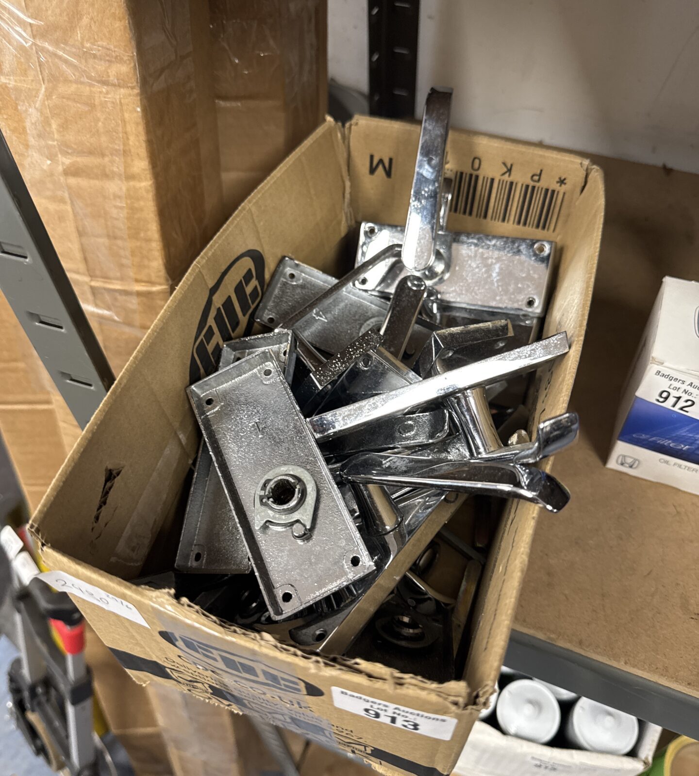 Box of chrome effect door handles