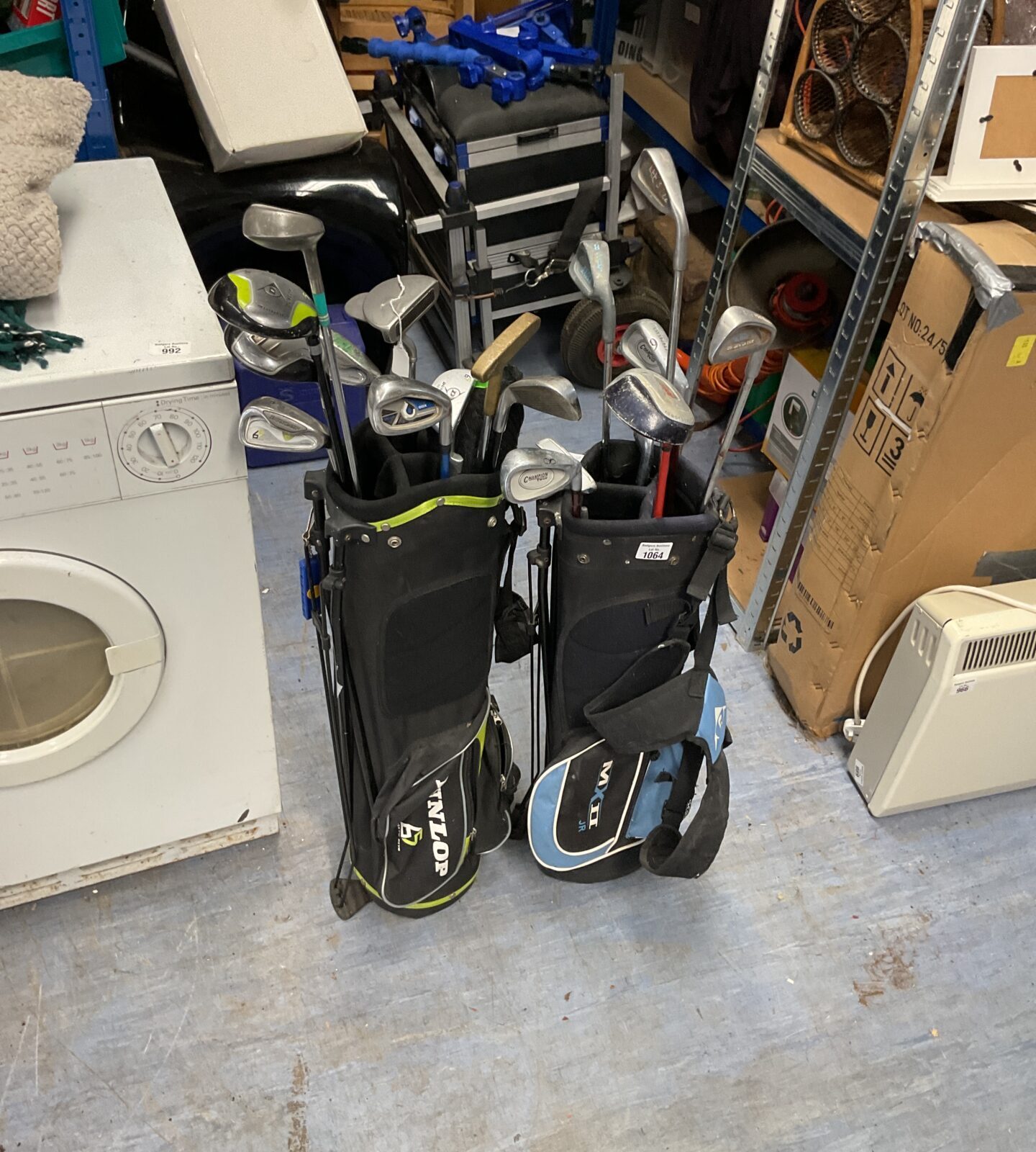 Selection of golf clubs inc junior clubs in bags