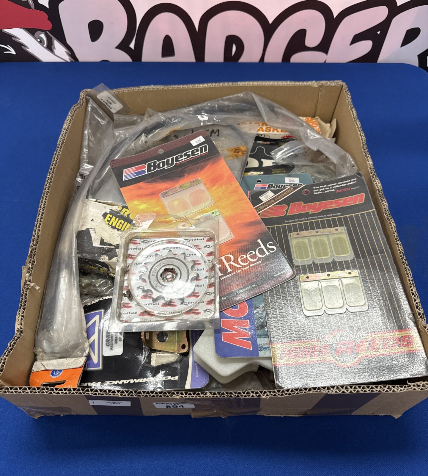 Tray of assorted motorcycle parts
