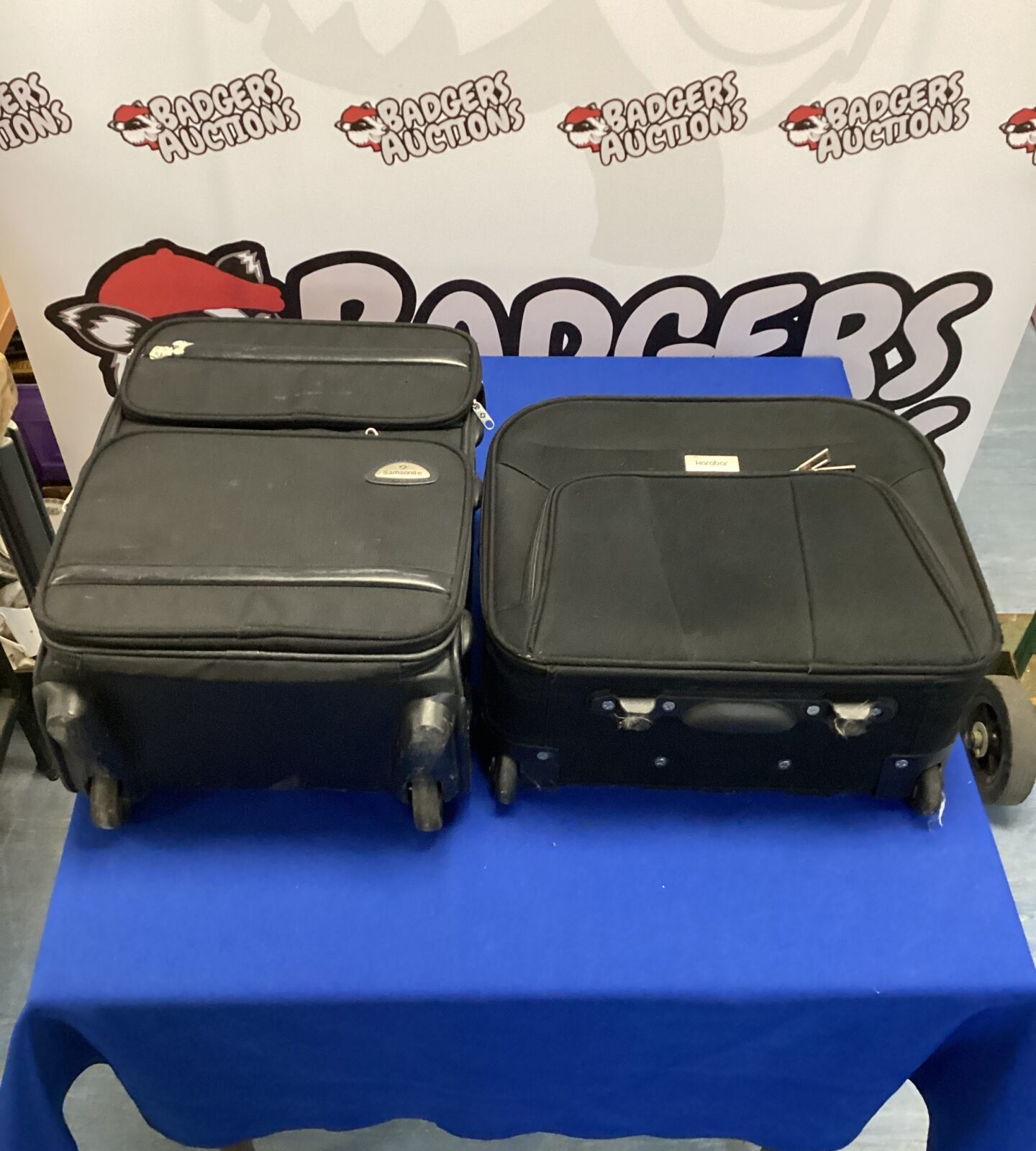 Small Karabar wheeled travel case & wheeled samsonite travel case both with extending handles