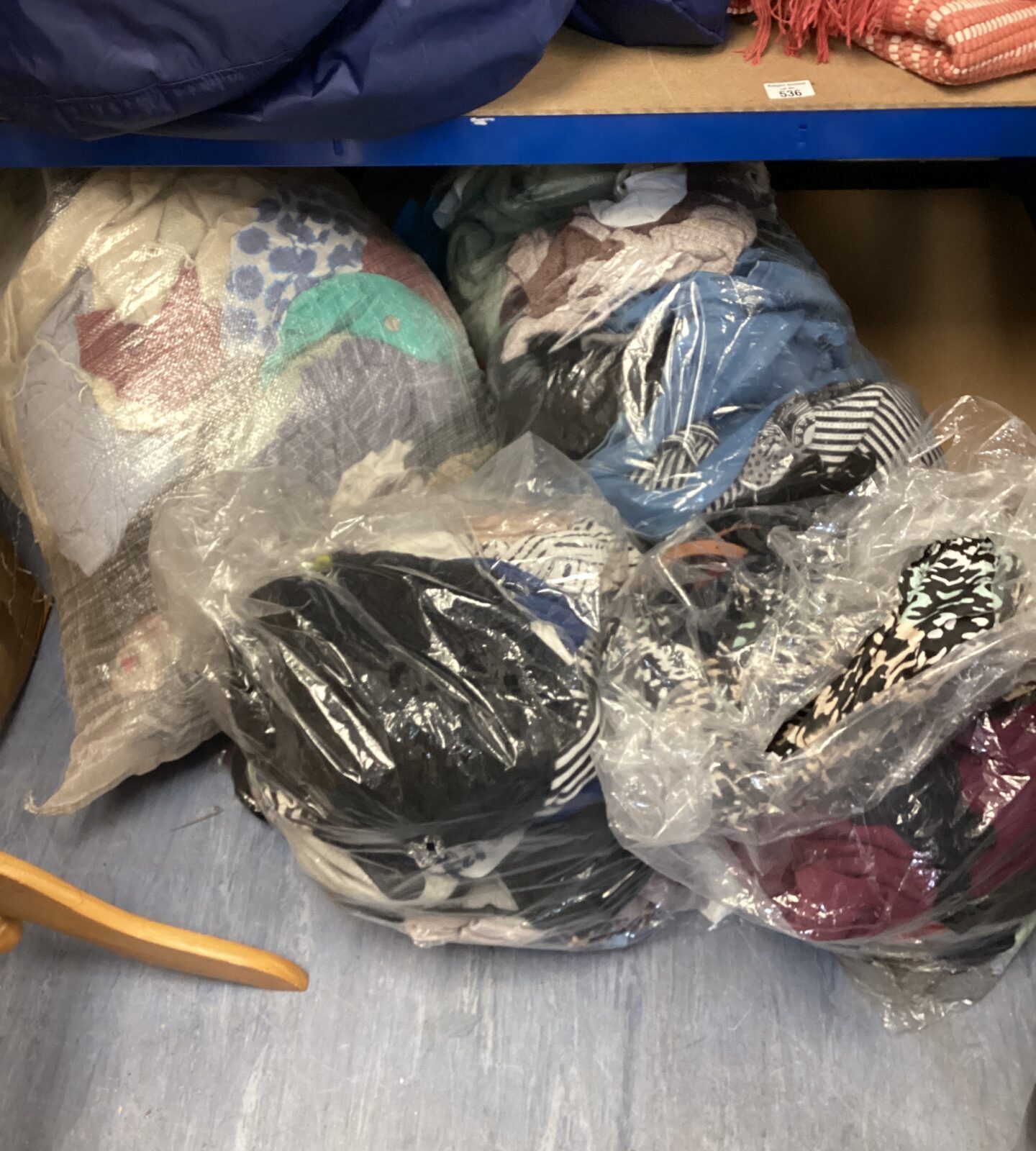 Four large bags of mixed clothing