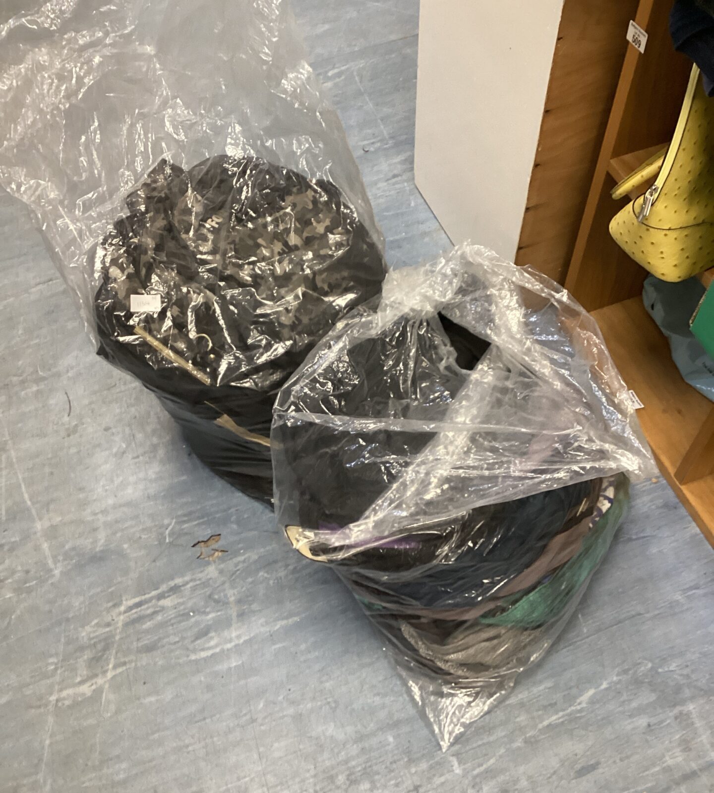 Two bags of assorted rucksacks & other bags
