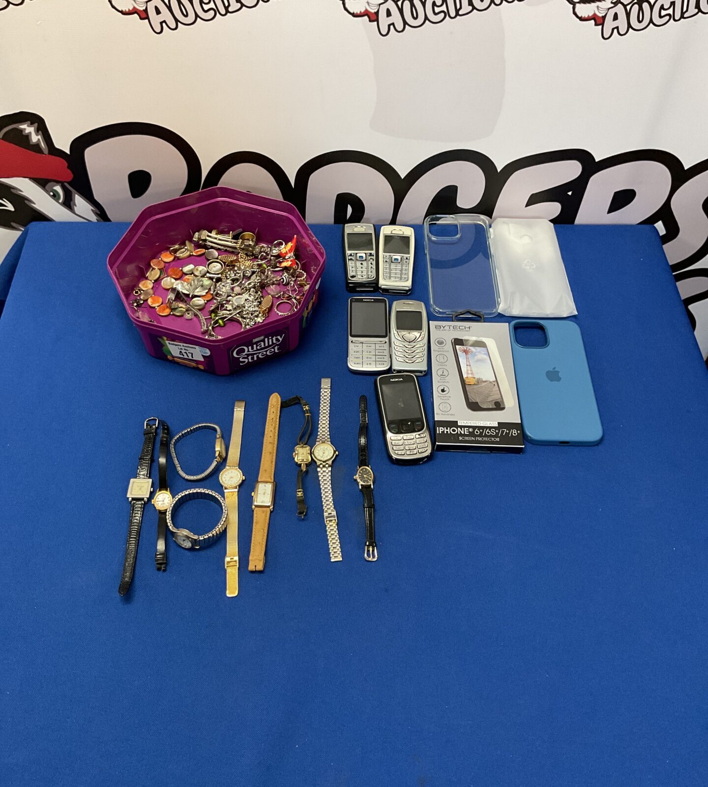 Boz of mixed inc phones, phone cases, mixed watches and costume jewellery